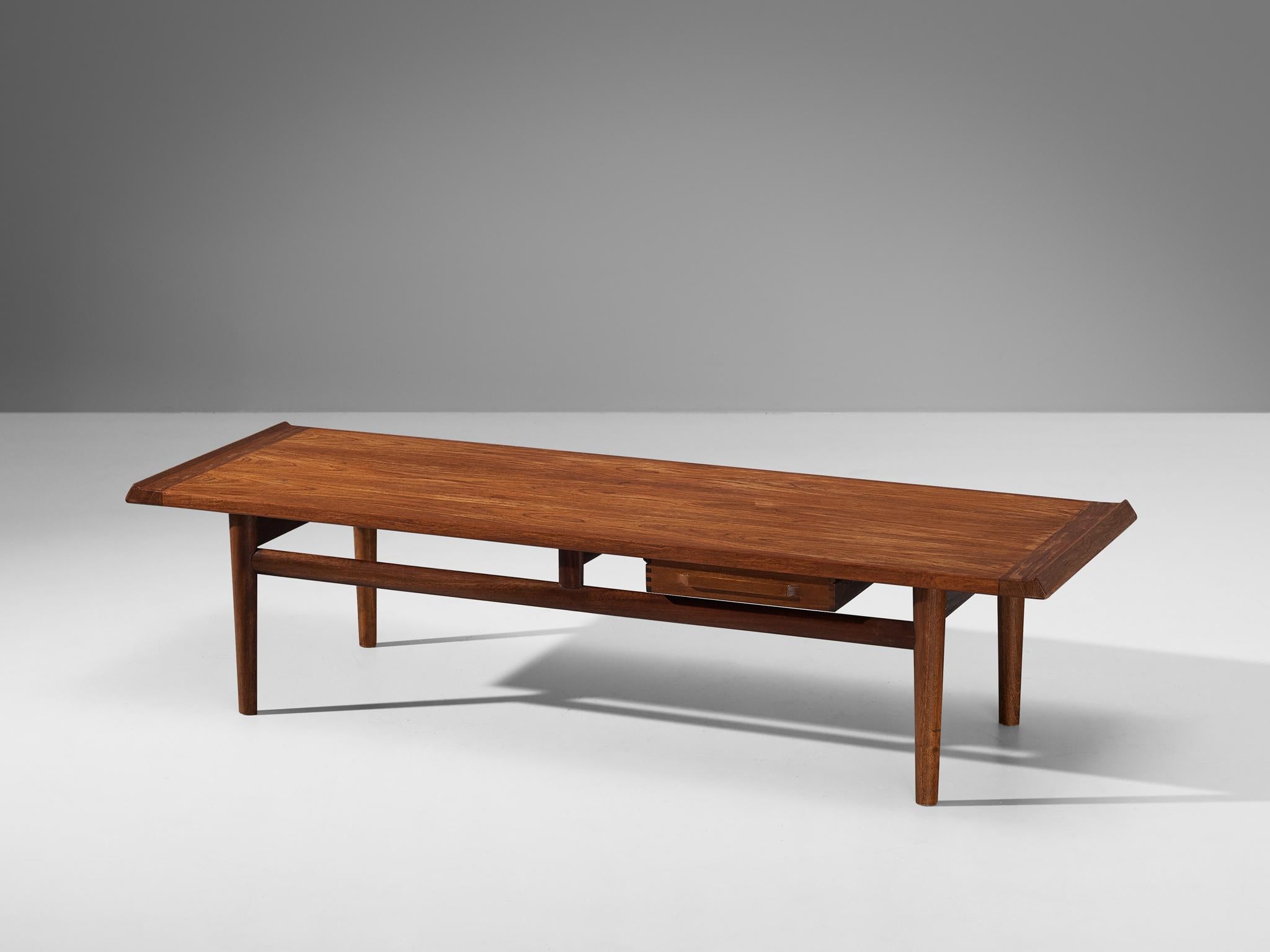 Torbjørn Afdal for Haug Snekkeri, coffee table, teak, Norway, 1964

A truly beautiful Norwegian coffee table executed in a warm and atmospheric teak. This table has an impressive size and is very sturdy and heavy. The quality of this piece is