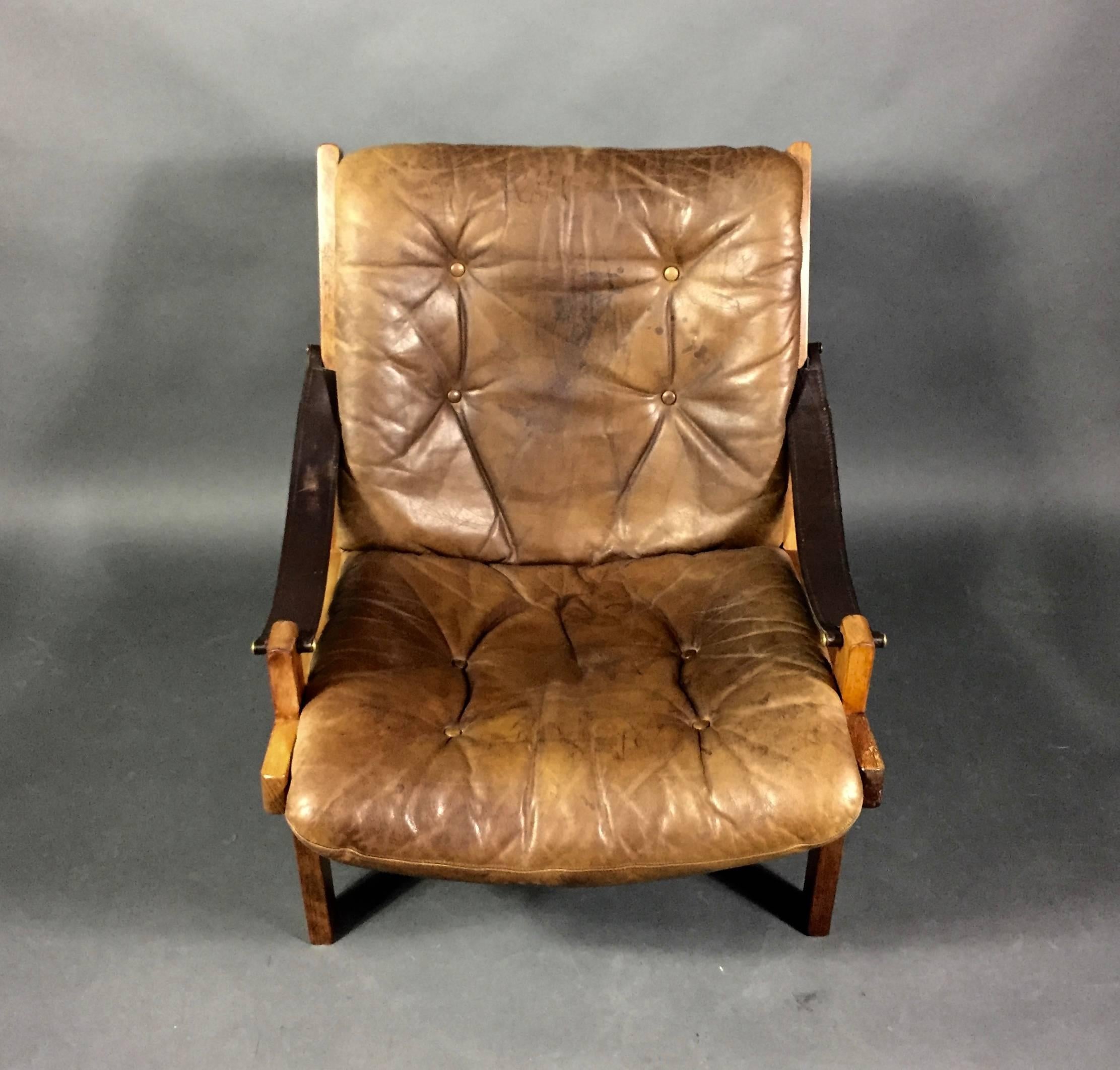 In the perfect Scandinavian safari chair tradition, prolific Norwegian designer Torbjørn Afdal created the 
