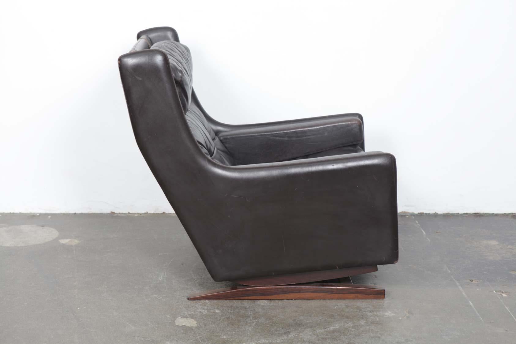 Vintage rocking chair in original black leather, designed by Torbjørn Afdal for Karl Sørlie & Sønner, Norway, 1960's. model 