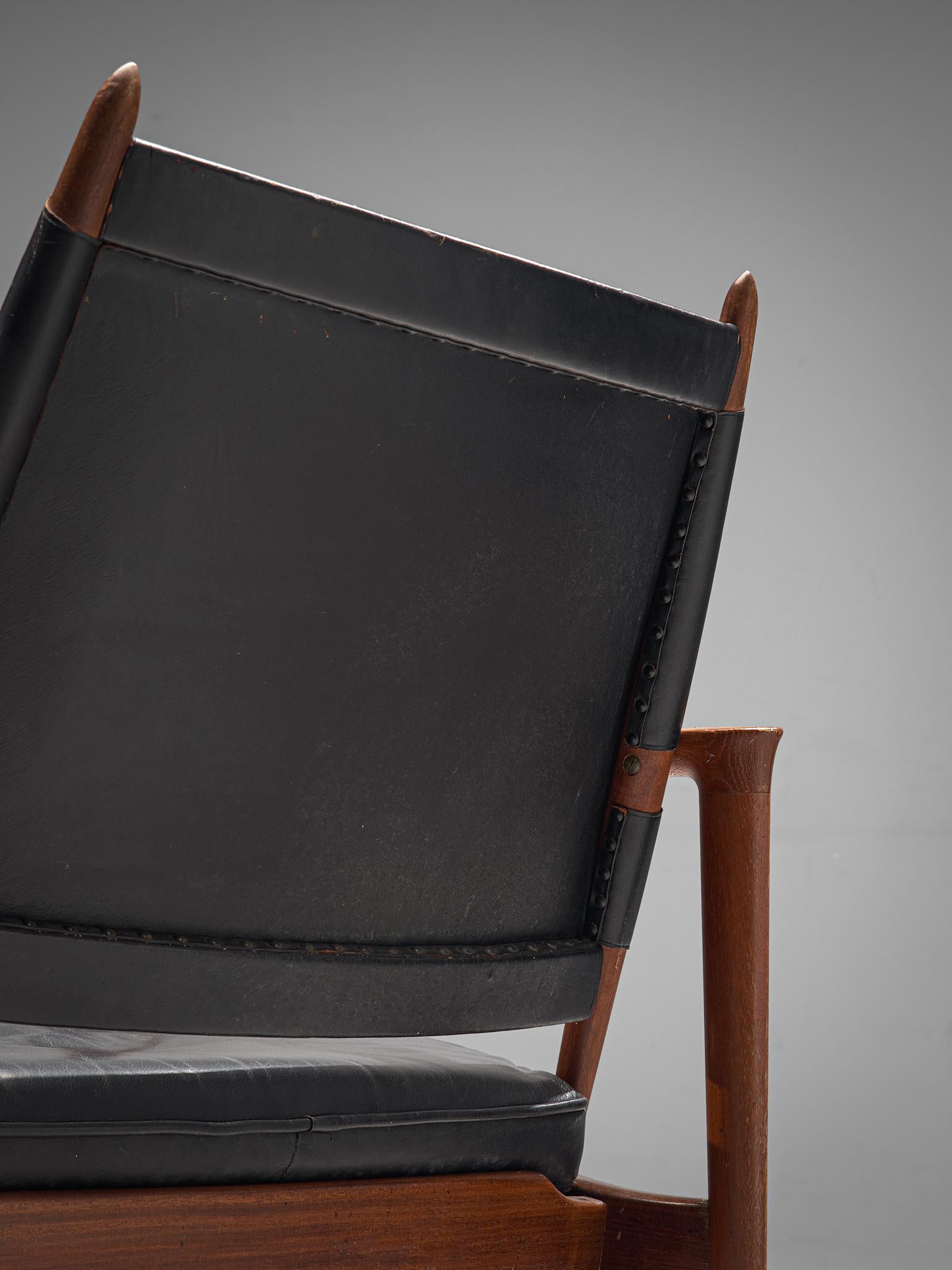 Mid-20th Century Torbjørn Afdal Pair of Armchairs in Teak and Black Leather, Norway, 1960s