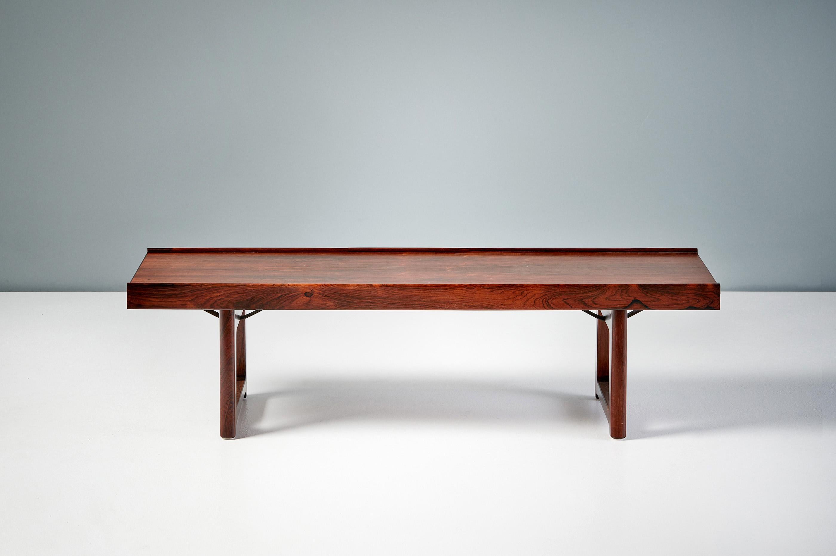 Torbjorn Afdal  - Krobo Bench, c1960

Highly figured rosewood bench or coffee table from Norwegian designer Torbjorn Afdal for Bruksbo. Produced c1960s with veneered top and solid legs.

H: 34cm  /  D: 37cm  /  W: 120cm 
 