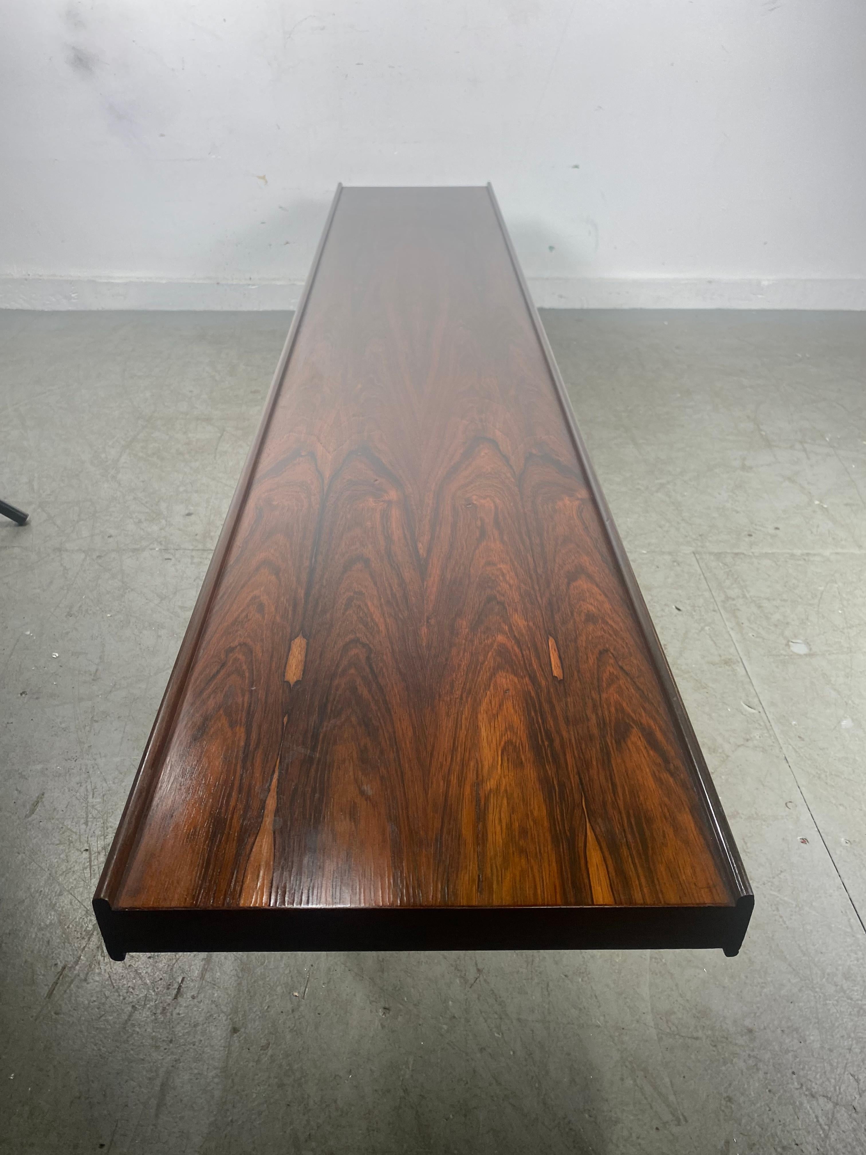 Krobo bench, table designed by Torbjørn Afdal.
Manufactured in Norway by Mellemstrands Trevareindustri during the 1960s.
Made from rosewood,,,,,Retains original label.. Hand delivery avail to New York City or anywhere en route from Buffalo