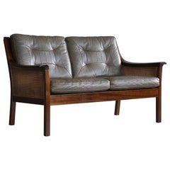 Retro Torbjørn Afdal Settee in Olive Colored Leather and Woven Cane for Bruksbo, 1960s