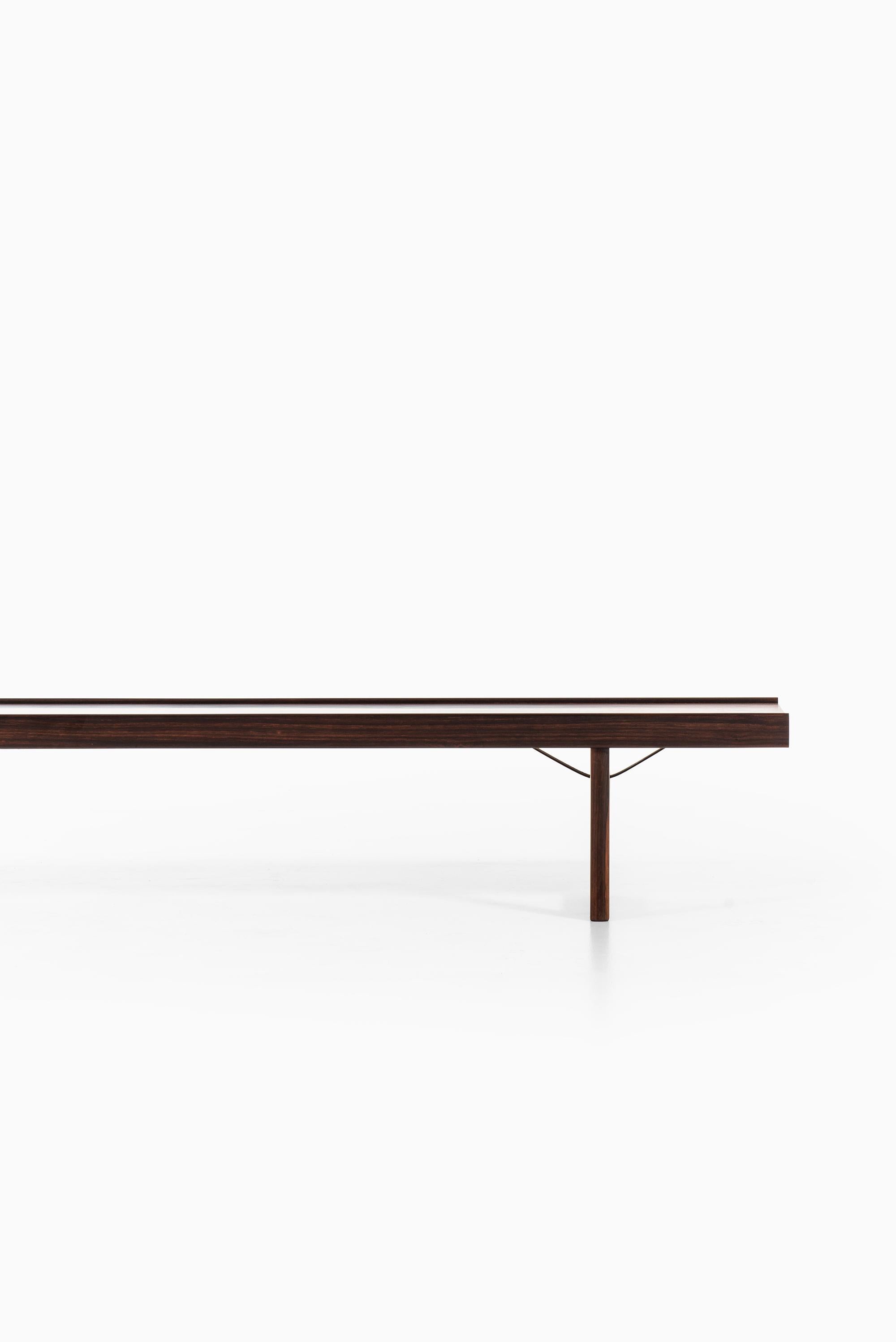 Bench / side table model Krobo designed by Torbjørn Afdal. Produced by Mellemstrands møbelfabrik in Norway.