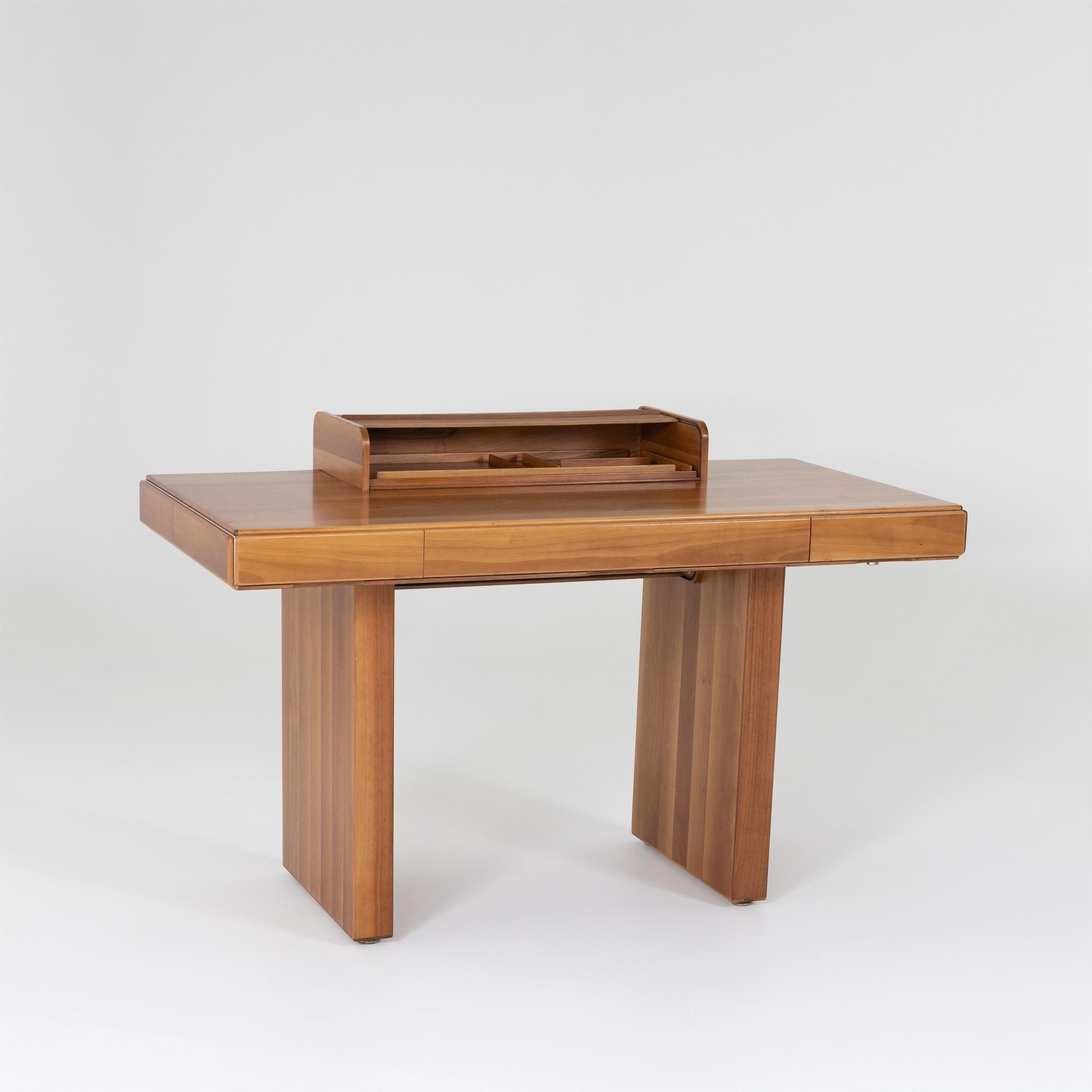 Desk by Tobia and Afra Scarpa, designed for Stildomus in the 1970s. The desk is equipped with three drawers and a top with a louvered door. Stamped on the inside.