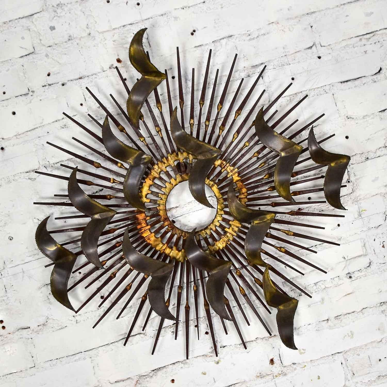 Fabulous torch cut brass birds on a horseshoe nail starburst wall art sculpture in the style of Silas Seandel or William Bowie. Comprised of horseshoe nails, brass, and brass braising. Gorgeous vintage condition with normal wear for age. The finish