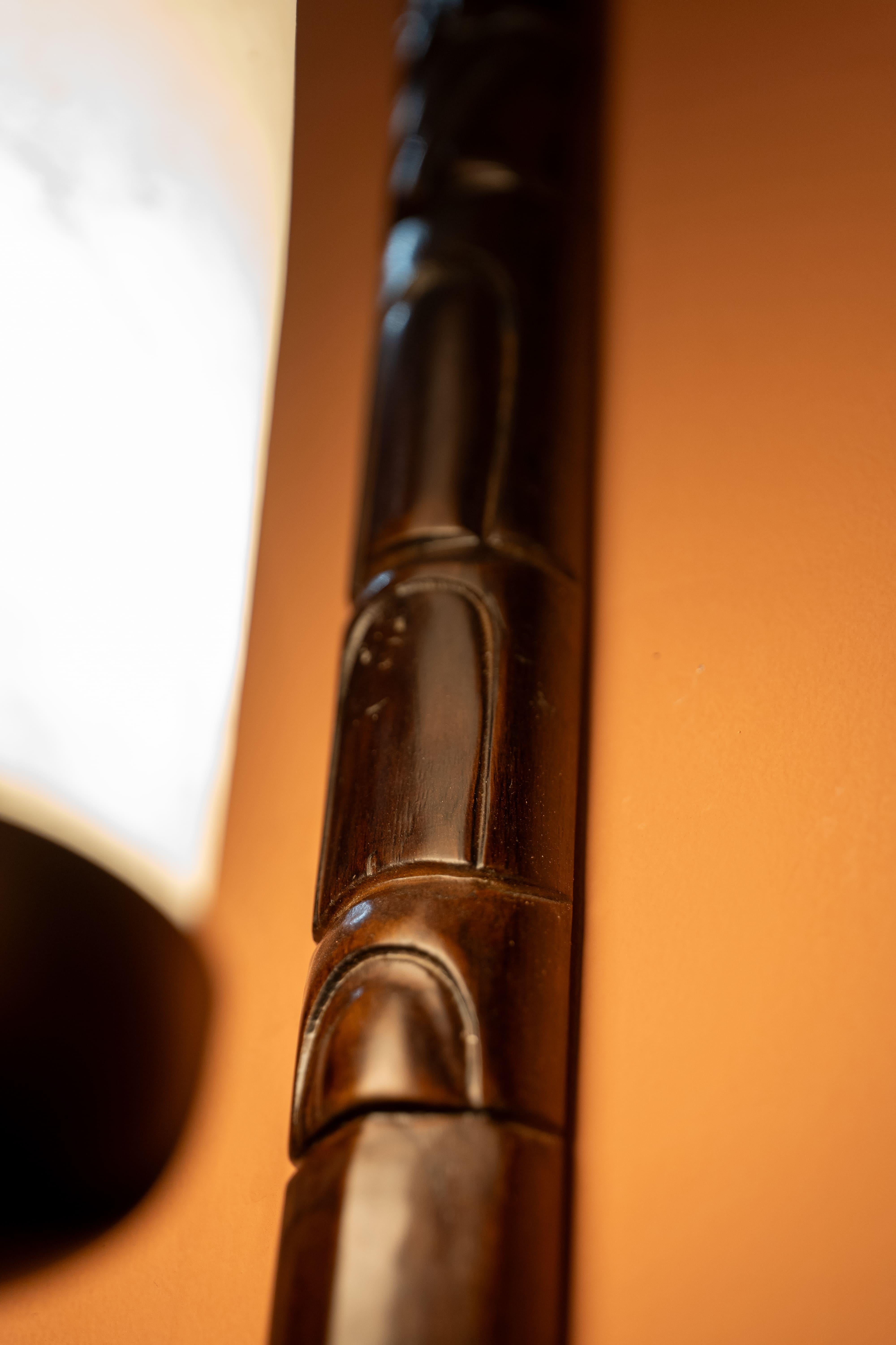 Illuminate your space with understated elegance using this sleek and modern wall lamp. Featuring an elongated alabaster diffuser, it emits a warm, ambient glow that enhances the atmosphere of any room with a touch of serenity and sophistication. The