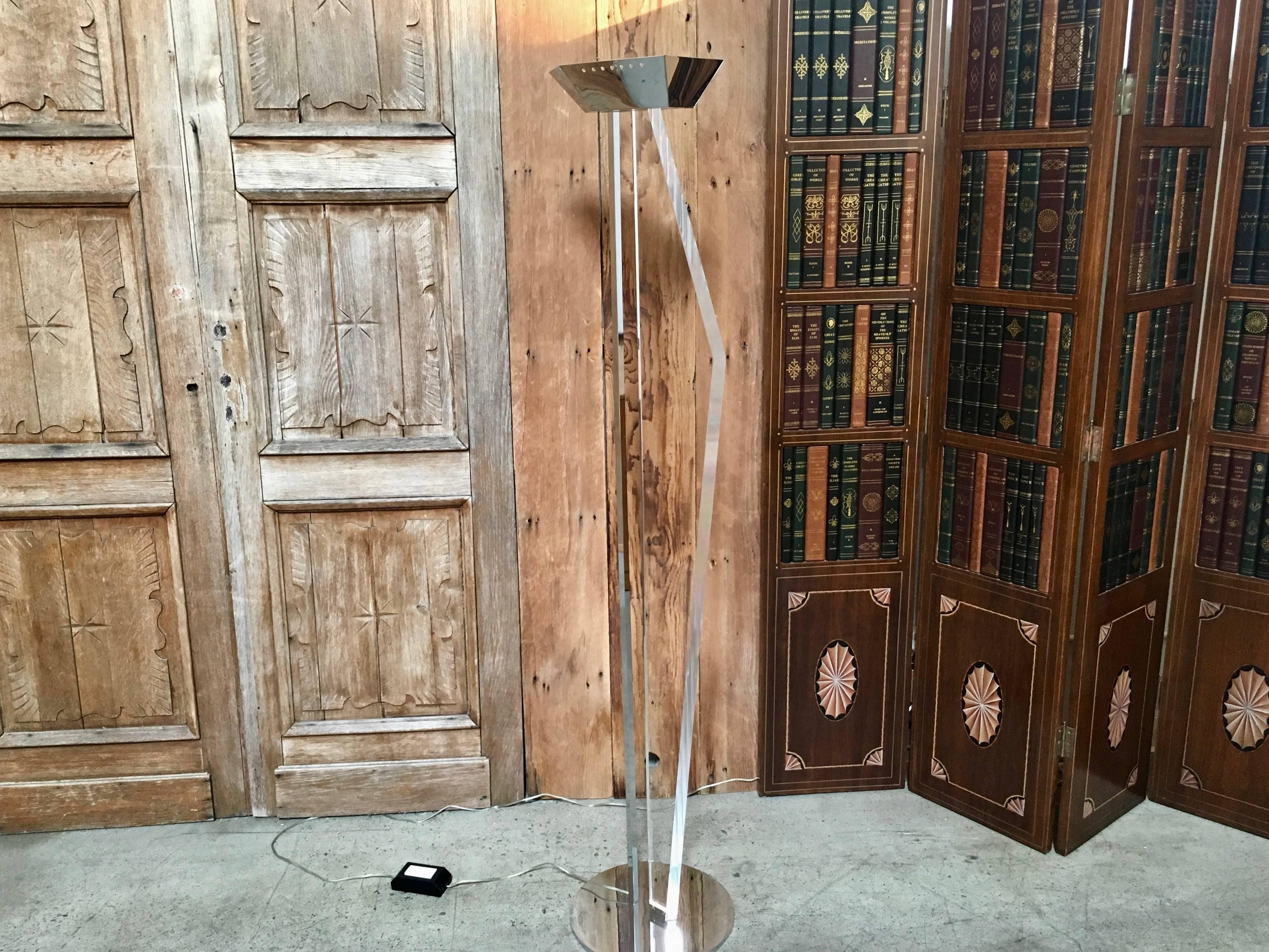 1980s Postmodern torchiere lamp with angular Lucite that glows when lit by halogen fixture.