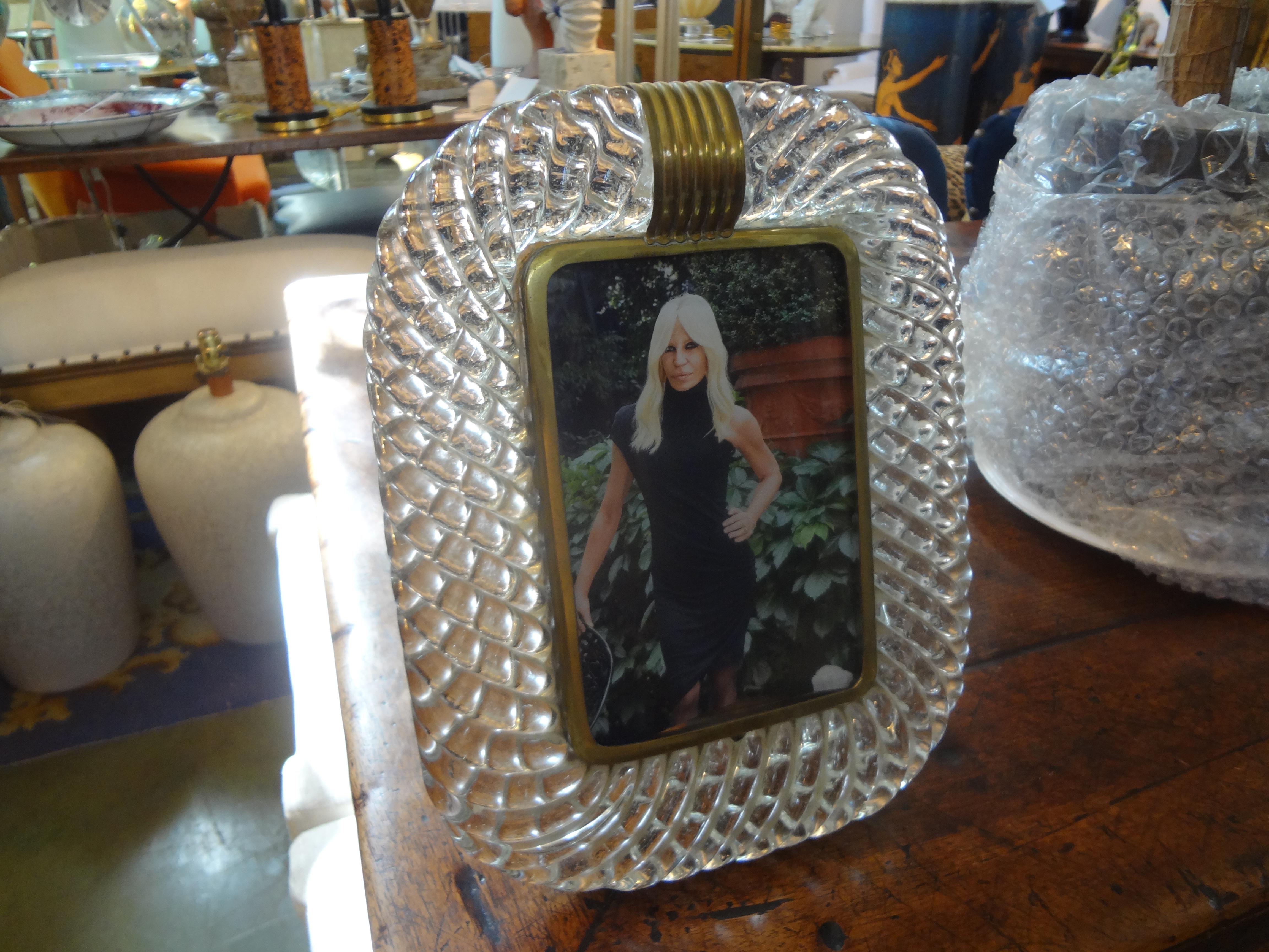 Stunning Treccia or torchon twisted murano glass and bronze photo frame by Venini. This vintage clear Italian Murano glass picture frame dates to the 1940s.