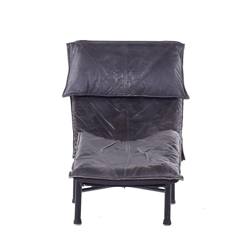 Tord Bjorklund for Ikea Mid Century Black Leather Chaise

This chaise measures: 28.75 wide x 61 deep x 38 high, with a seat height of 13 inches

All pieces of furniture can be had in what we call restored vintage condition. That means the piece is