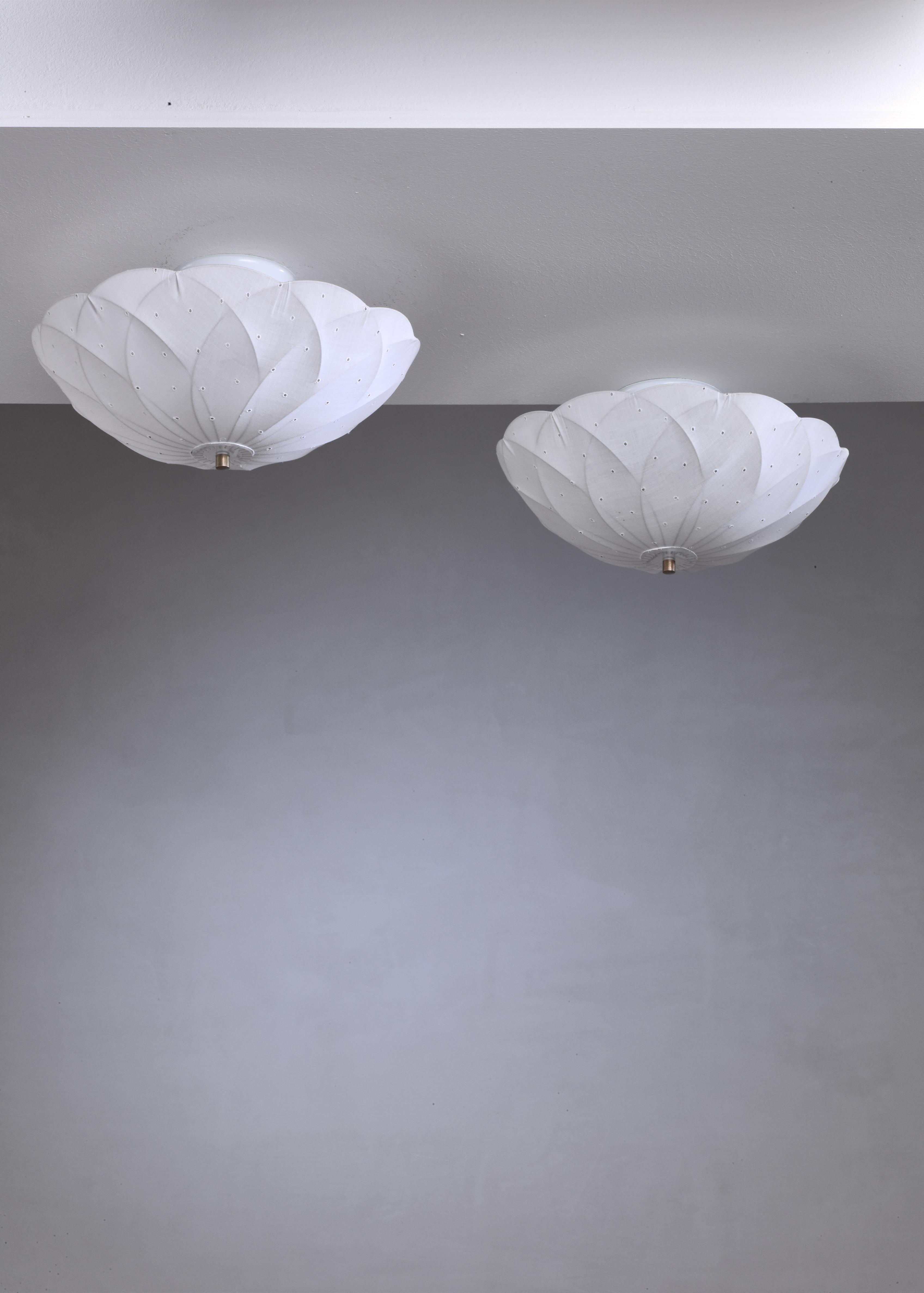 A 'Pia' flush mount ceiling lamp designed by Swedish architect Tore Ahlsén for Gärsnäs. The lamp has a white fabric shade on a metal wire frame.

We also have four pendants available by Tore Ahlsen in the same modern bohemian style.

Price is per