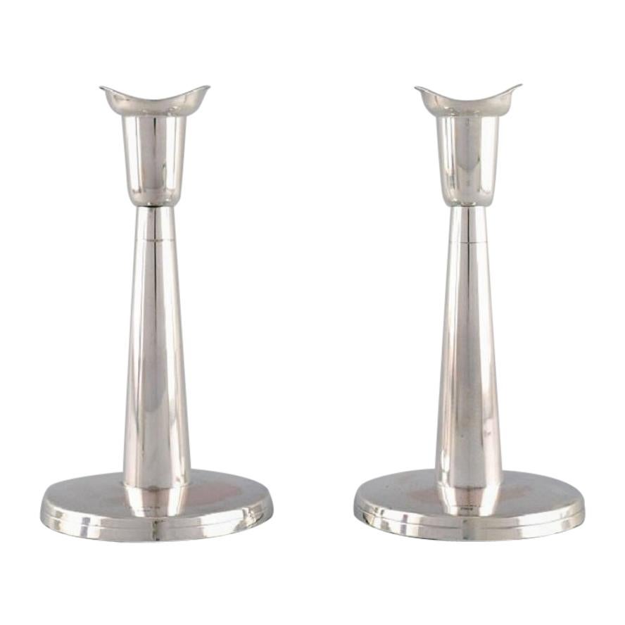 Tore Eldh, Swedish Silversmith, a Pair of Modernist Candlesticks in Silver