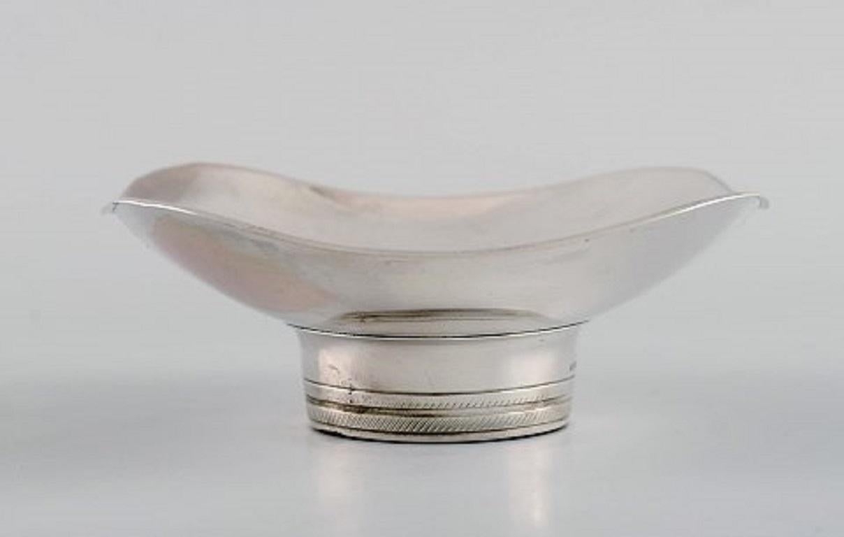 Tore Eldh, Swedish silversmith. Modernist silver bowl on foot. Dated 1965.
Measures: 12 x 4.2 cm.
In excellent condition.
Stamped.