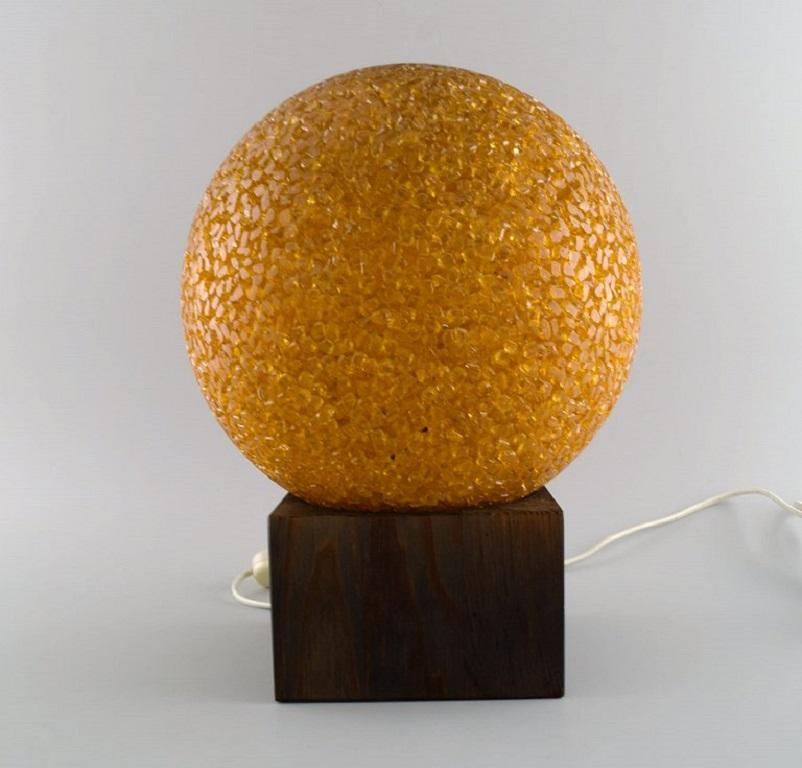 Töreboda, Sweden. BIAB. Retro table lamp. 
1960s.
Measures: 32 x 25 cm.
In excellent condition.
Sticker.
Material: Plastic and wood.