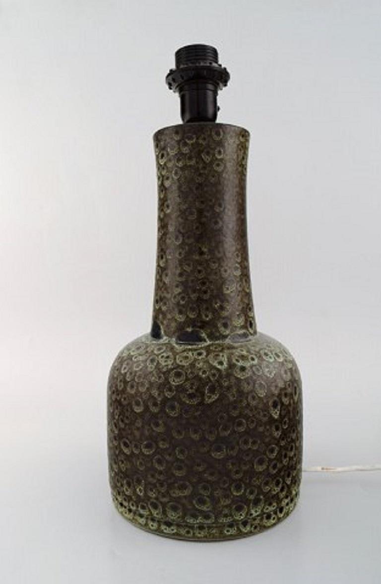 Töreboda, Sweden. Large retro lamp in glazed ceramics. Beautiful speckled glaze in green shades, 1960s-1970s.
Measures: 33 x 18 cm.
In very good condition.
Stamped.
 
