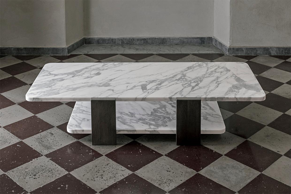Torii coffee table connects the proportion of an ancient Japanese gate to daily experience, linking ceremonial and domestic rituals. The 2 monolithic Carrara marble tabletops are connected by solid oak legs, available in dark or charcoal finish.
 