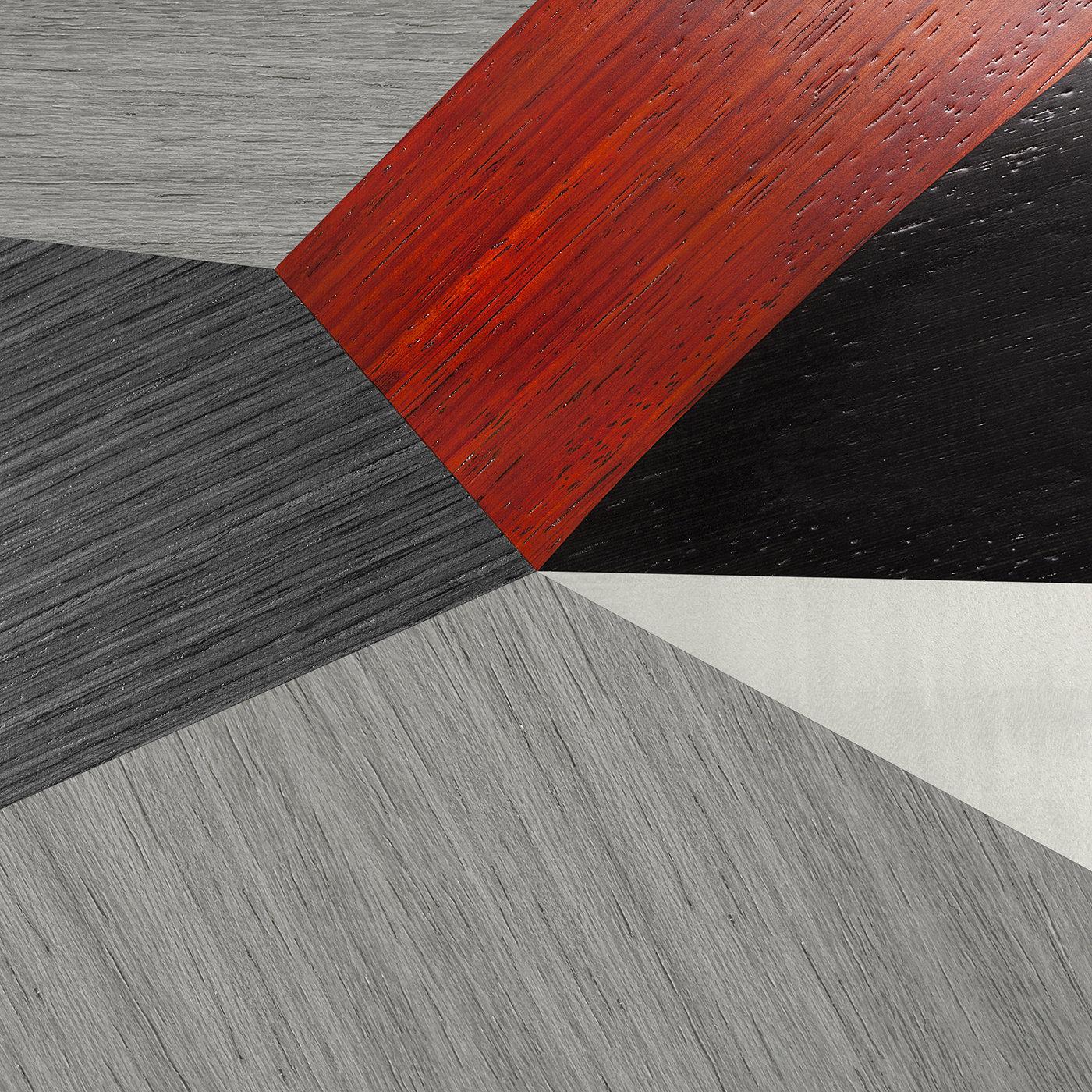 Part of the Torino e il Futurismo Collection, this exquisite coffee table will make a stunning centerpiece of any living room ensemble. Characterized by abstract design in bold color combination of white, black, red, and gray, the top is crafted of