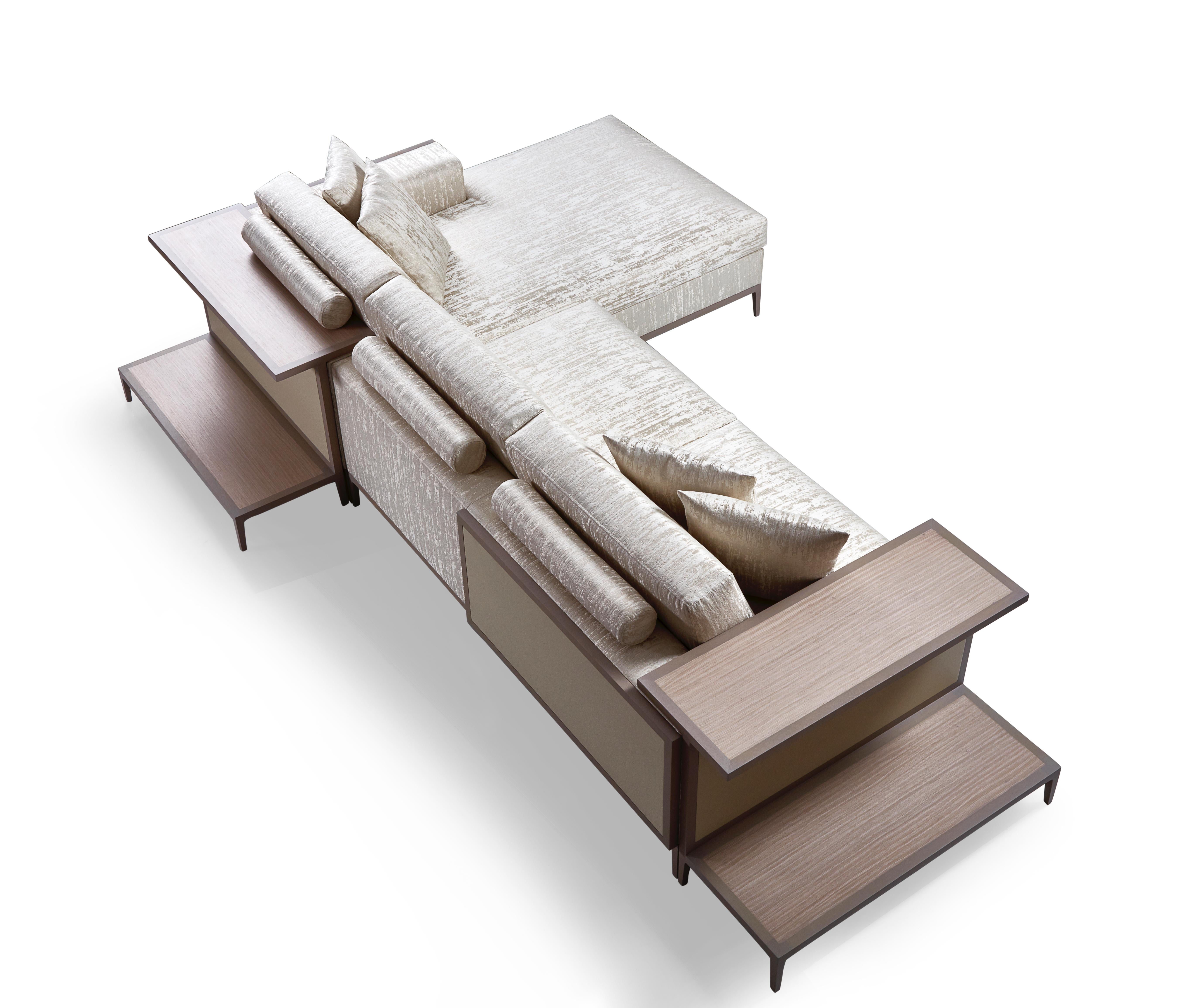 Highly functional style that is handsome from every angle, this sofa was designed to float in a room. A back shelf for a table lamp and books, and a side table for drinks make this piece a centerpiece for entertaining or family lounging.