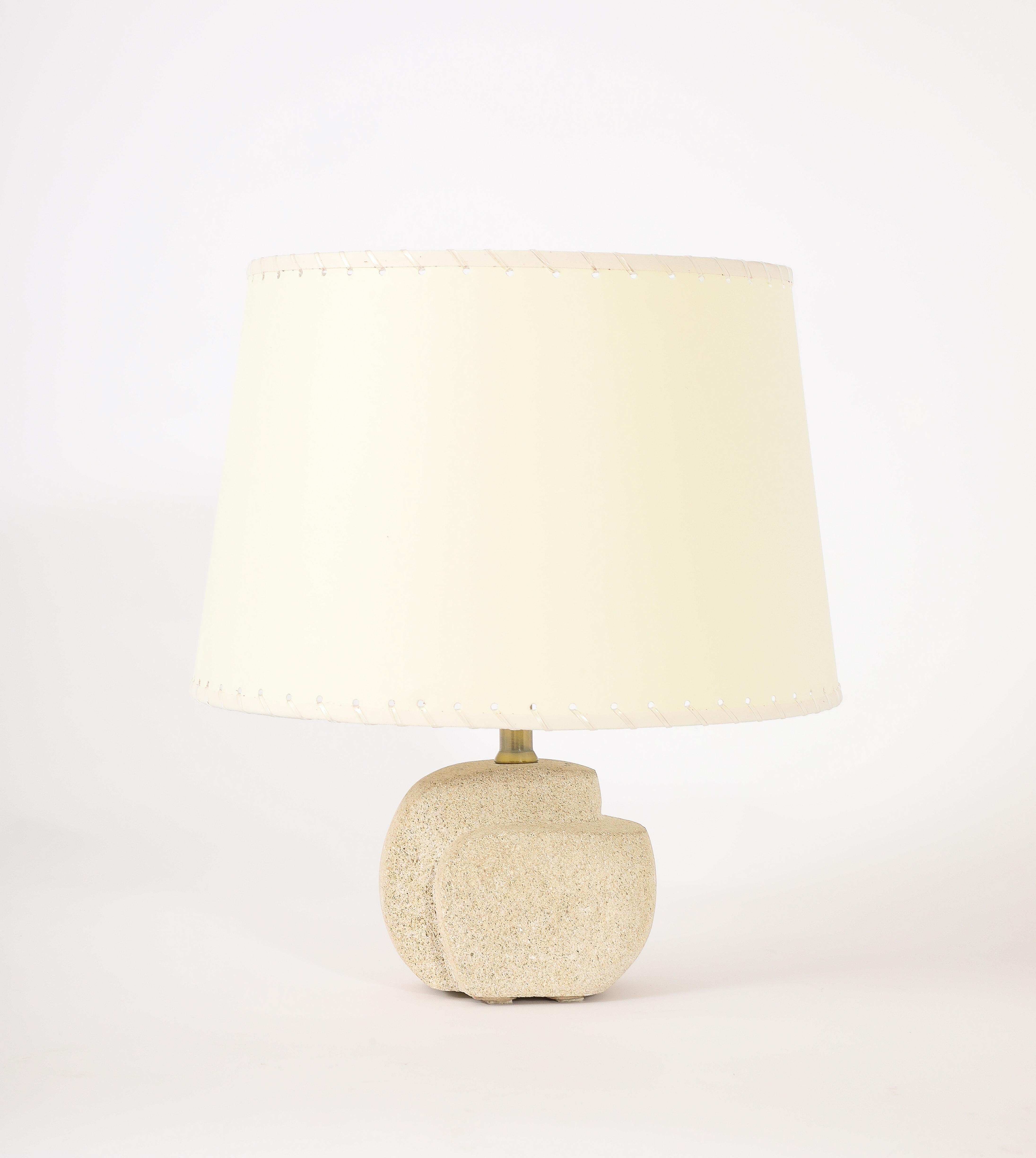 Solid Pierre du Gard table lamp with an asymmetric detail.
