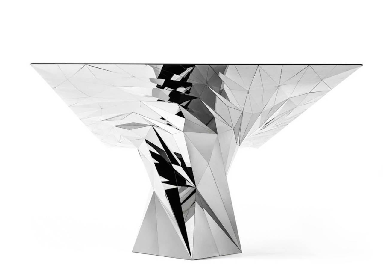 The stainless steel Tornado table is a perfect example of Zhoujie’s philosophy of actionless. Like a force of an airplane, polymerizing inward and flowing with natural tendency. The digital generation process only took a few seconds, but the