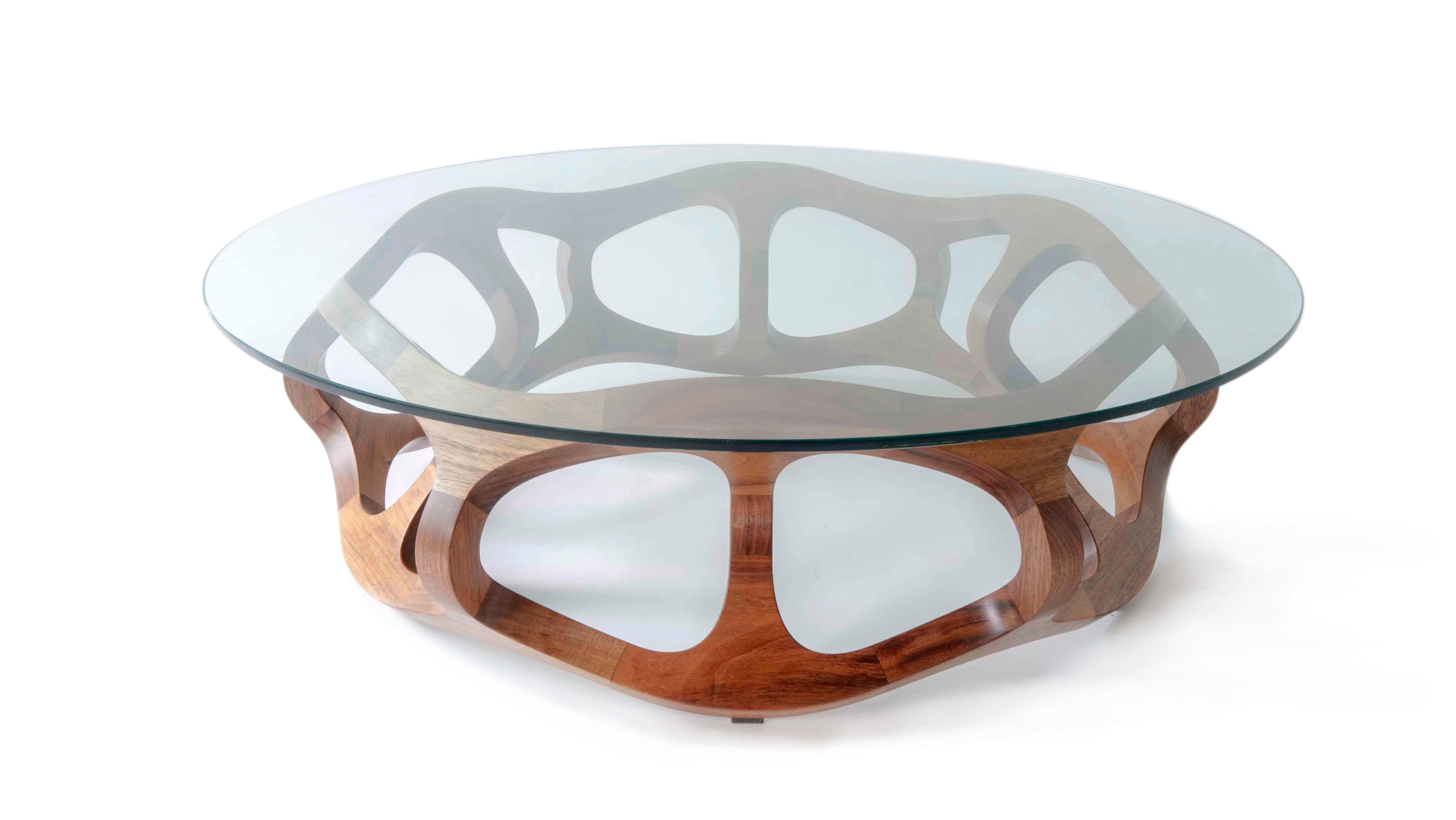 This contemporary sculptural coffee table is created by renowned Mexican Industrial designer Pedro Cerisola, whose work is in the permanent collection of the National Autonomous University Science Museum and has been exhibited in the Franz Mayer