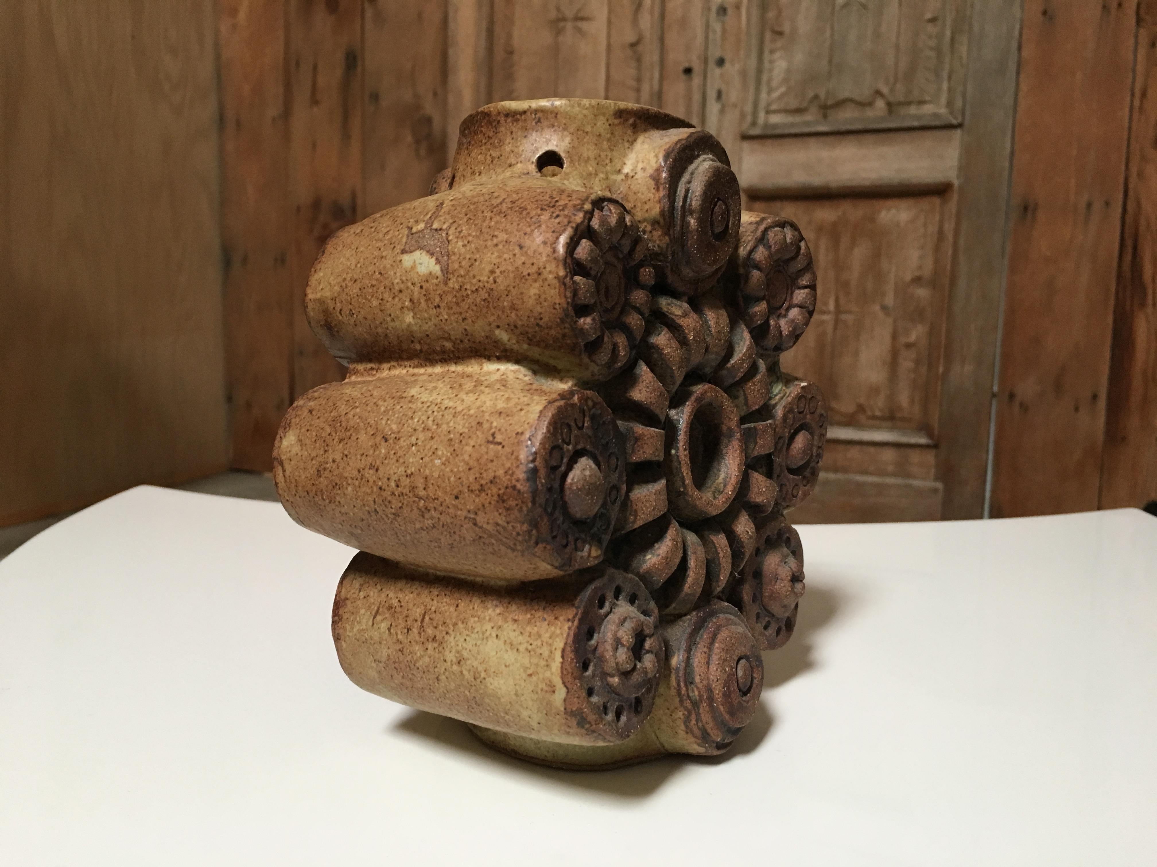 Vintage stoneware vase.

In 1960 he set up his own workshop in Forest Hill, London, Progressive designs were readily accepted in London at that time, and Rooke applied his efforts to making pieces of a sculptural nature. The early pieces were