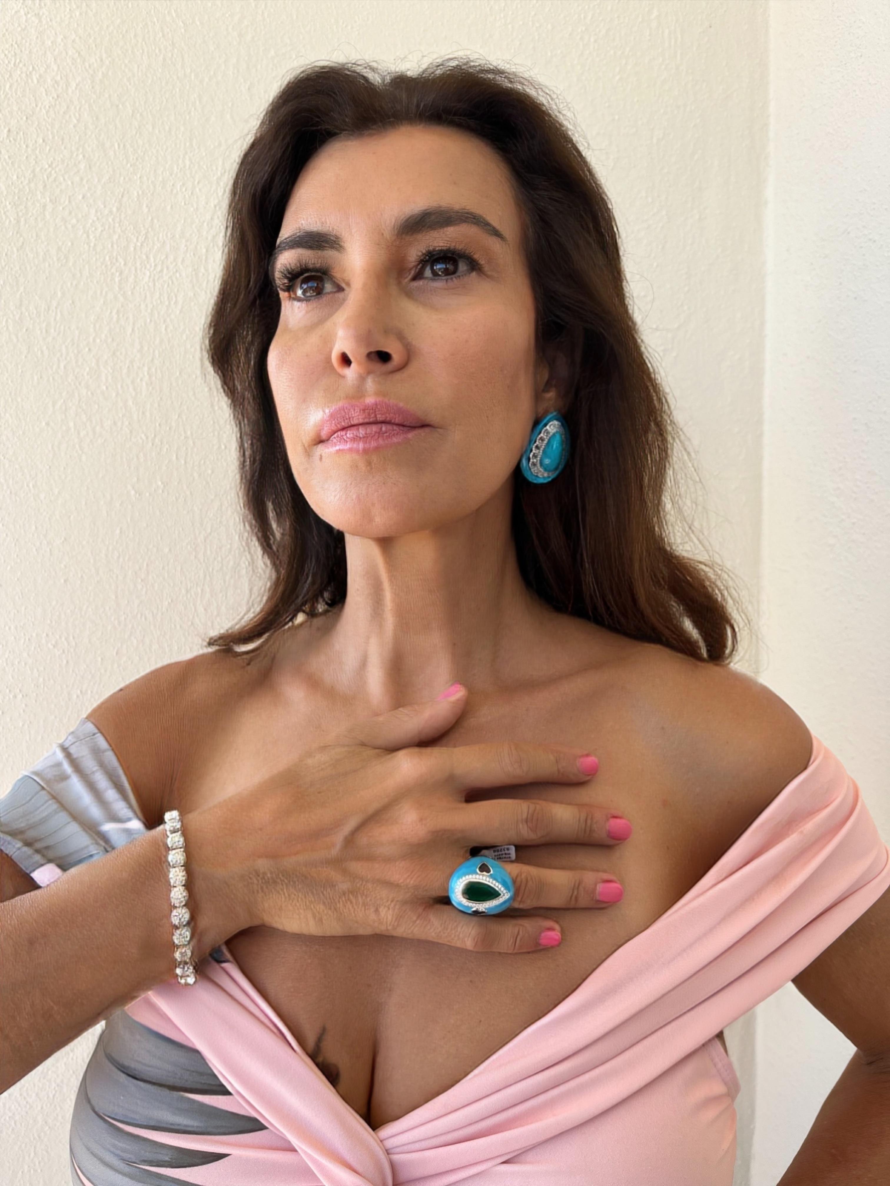 Torquoise Oval Earrings with Diamonds in 18k gold
Total Weight  19,61 gr
Diamonds  3,39 ct 
Turquoise  36,34 ct

Irama Pradera is a dynamic and outgoing designer from Spain that searches always for the best gems and combines classic with