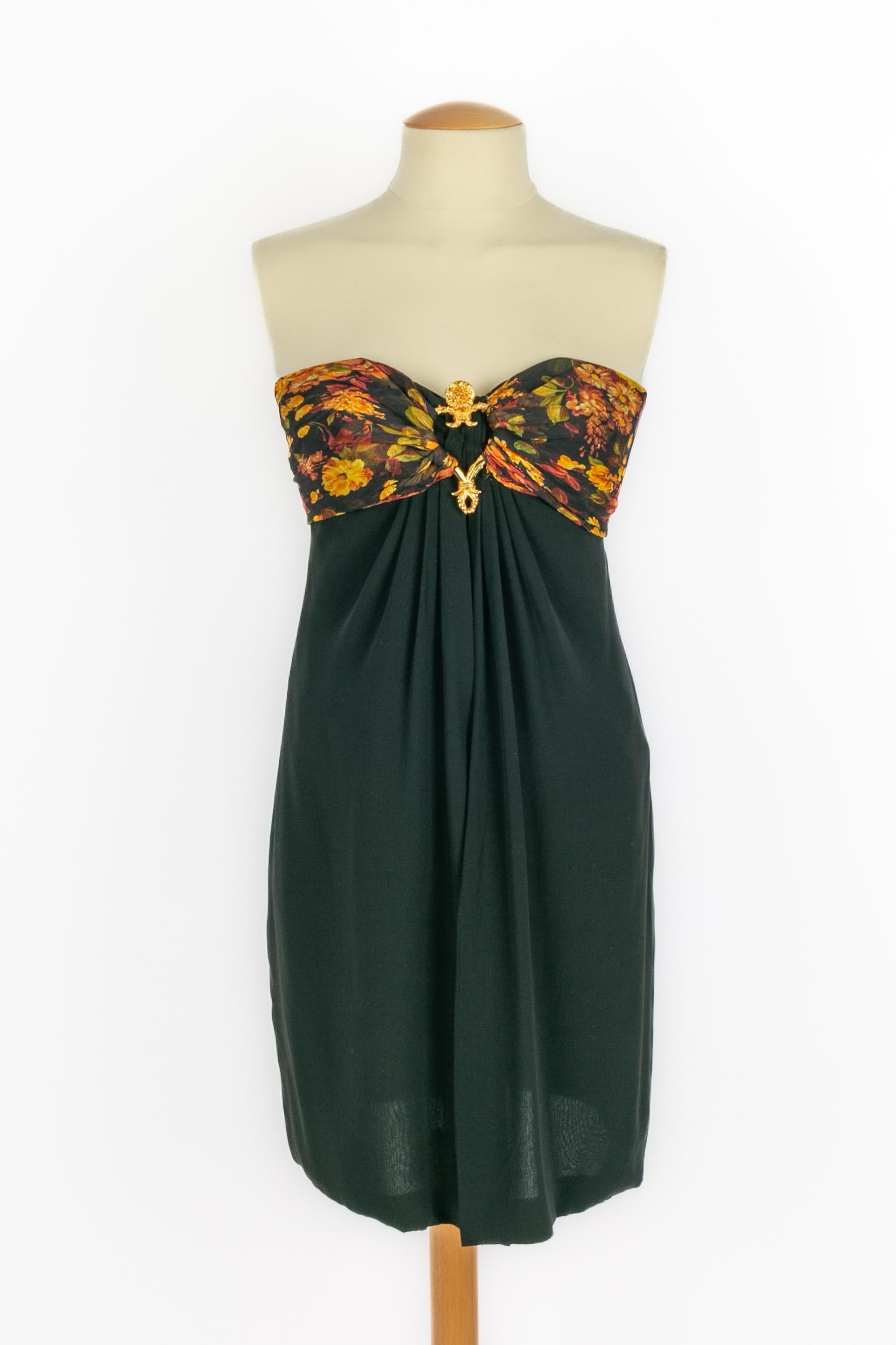 TORRENTE - (Made in France) Black silk and silk muslin bustier dress printed with flowers. Composition and size labels missing, it fits a 36FR.

Condition:
Very good condition

Dimensions:
Chest: 36 cm - Length: 72 cm

SKU:VR209
