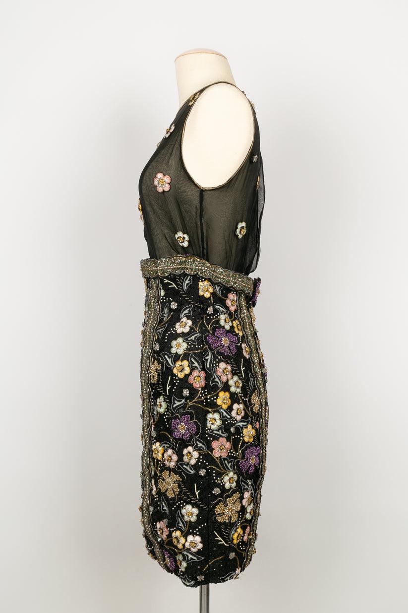 Torrente Haute Couture - Dress embroidered with flowers, beads, and sequins. No composition or size tag, it fits a size 36FR.
Haute Couture Spring/Summer 1991 Collection

Additional information: 
Dimensions: Bust: 44 cm (17.32