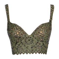 Top in pelle di struzzo verde con orlo corto di TorRENTE Haute Couture