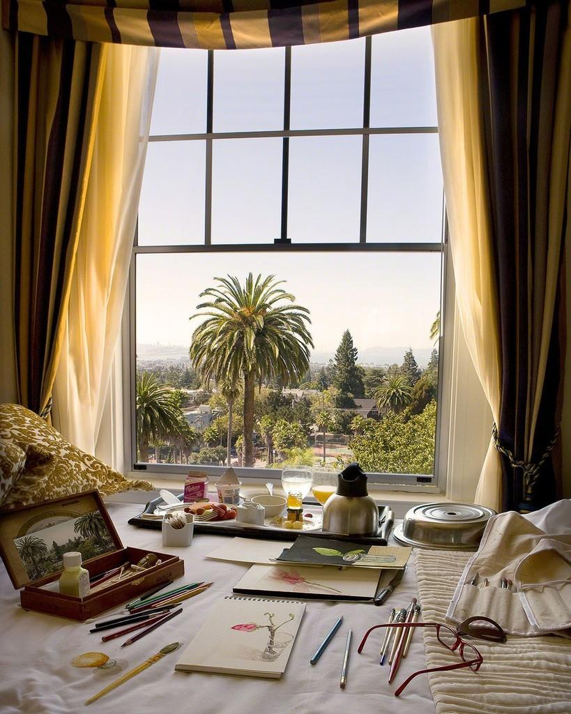 Torrie Groening Color Photograph - Still Life with California - Artist hotel studio breakfast, paints, palm trees