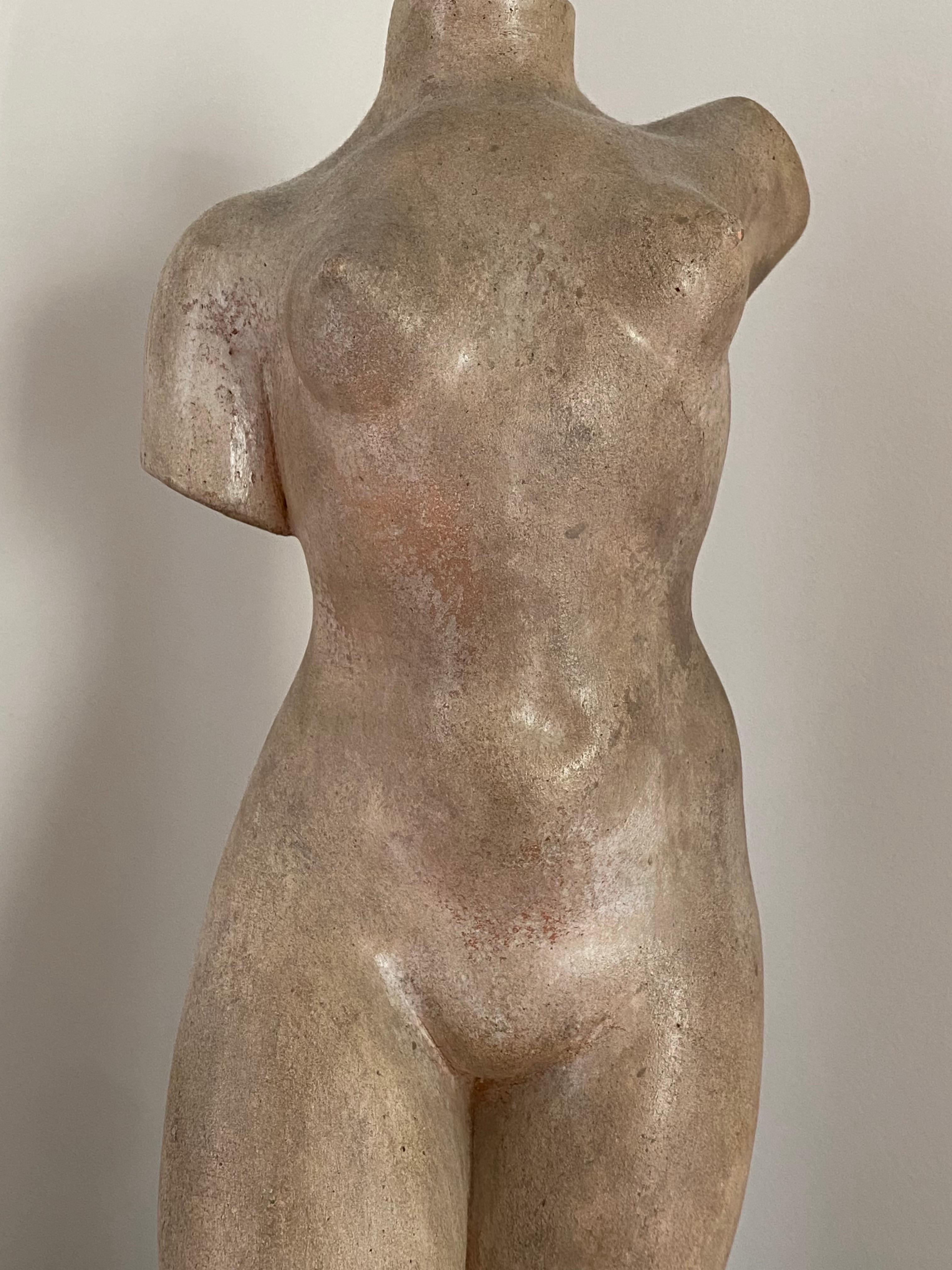 A c1935, Art Deco period terracotta figural sculpture titled 