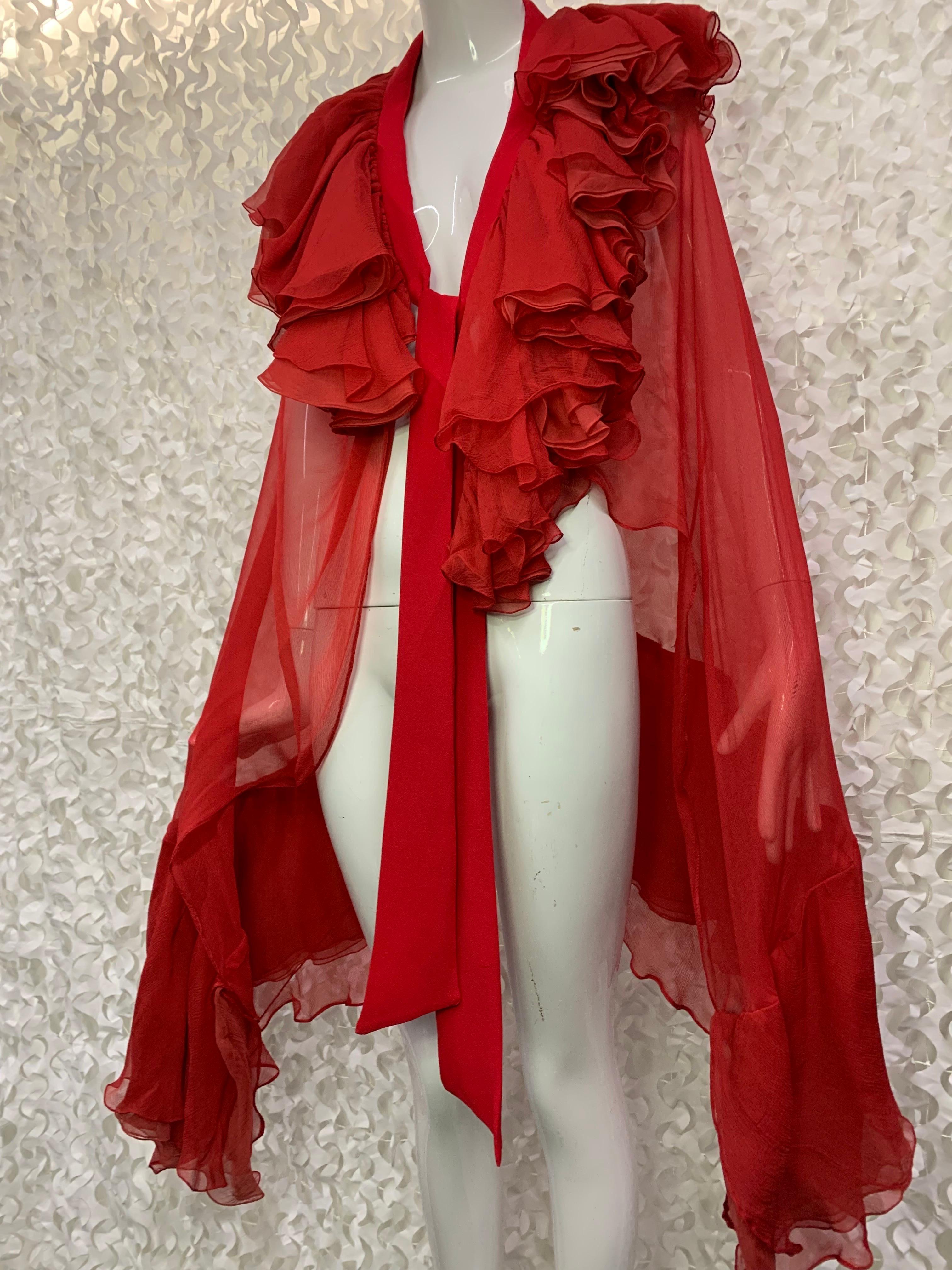 Torso Creations Crimson Red Silk Chiffon Cape w Lush Ruffles & Silk Foulard Tie. Inspired by 1920s Art-Deco chic, these layered asymmetrical ruffles are bias cut and hand rolled in varying shades of red. All fabric reimagined from a Pauline Trigere
