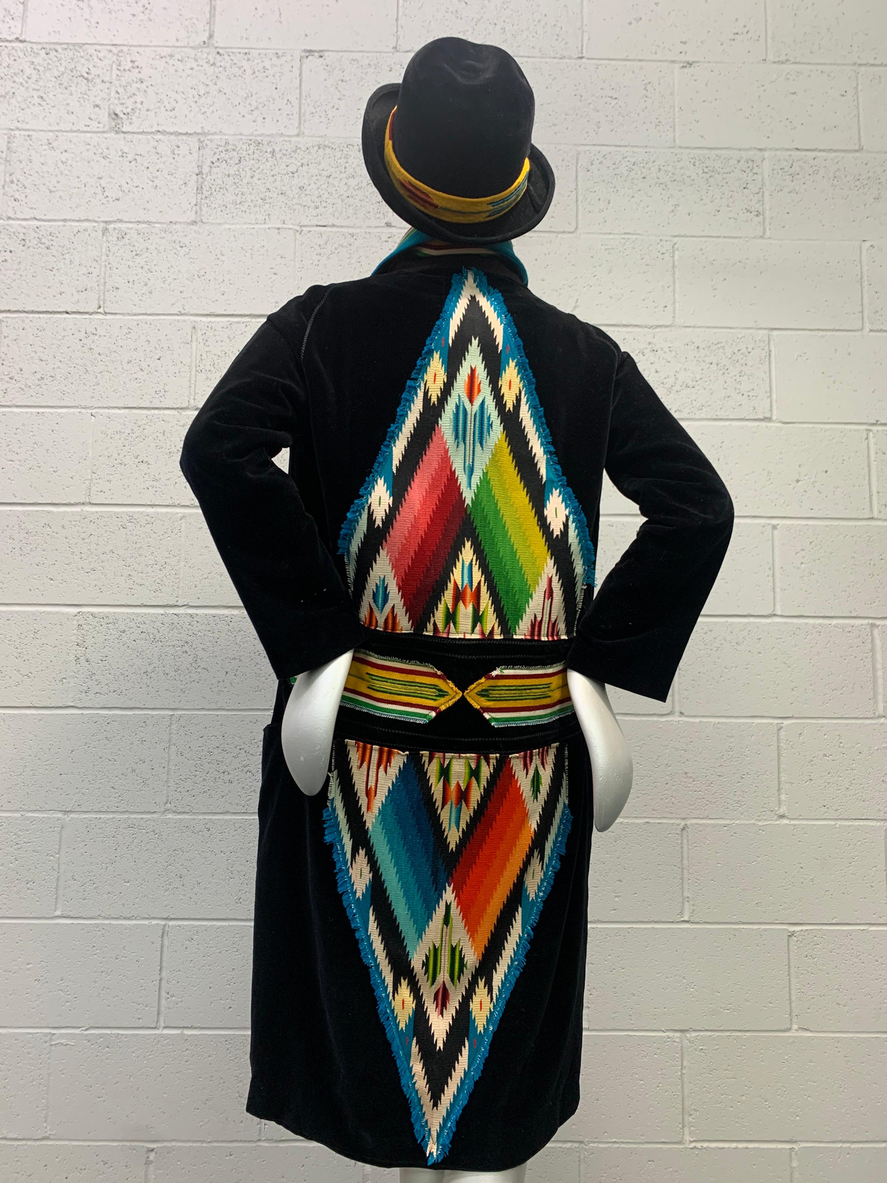 A Torso Creations Art Deco-inspired 1920s dropped-waist, velvet car coat and matching black felt fedora, embellished with vintage Chimayo hand-woven blanket appliques and hatband. Kimono tie-style wrap closure with interior tie and button and loop