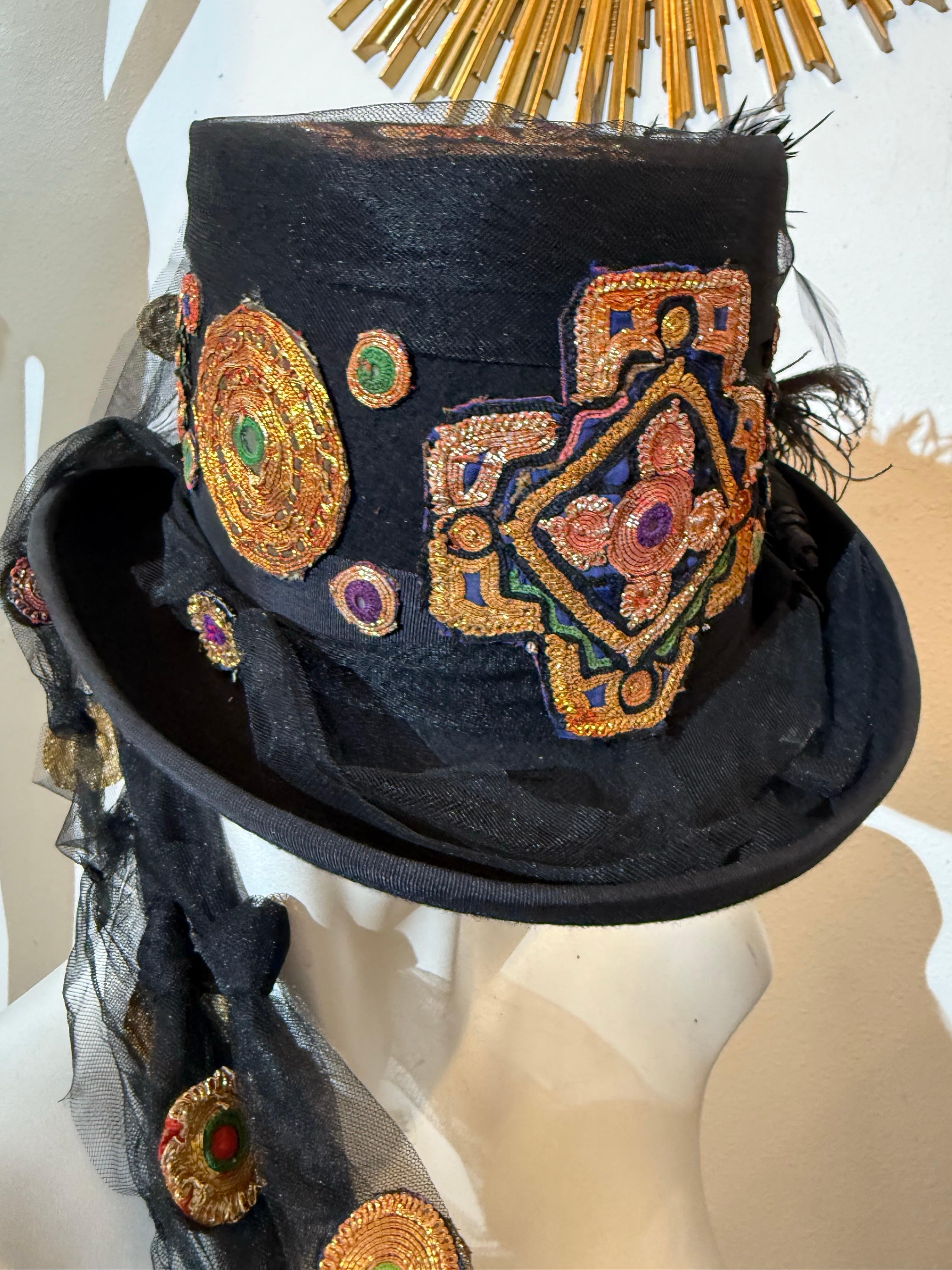 Torso Creations Festival Top Hat w Indian Embroidered Applique & Tulle Streamers: This one-of-a-kind, unisex, wool felt top hat has been restyled with vintage Indian-embroidered patches on crown, band and brim. Features a bundle of tulle streamers