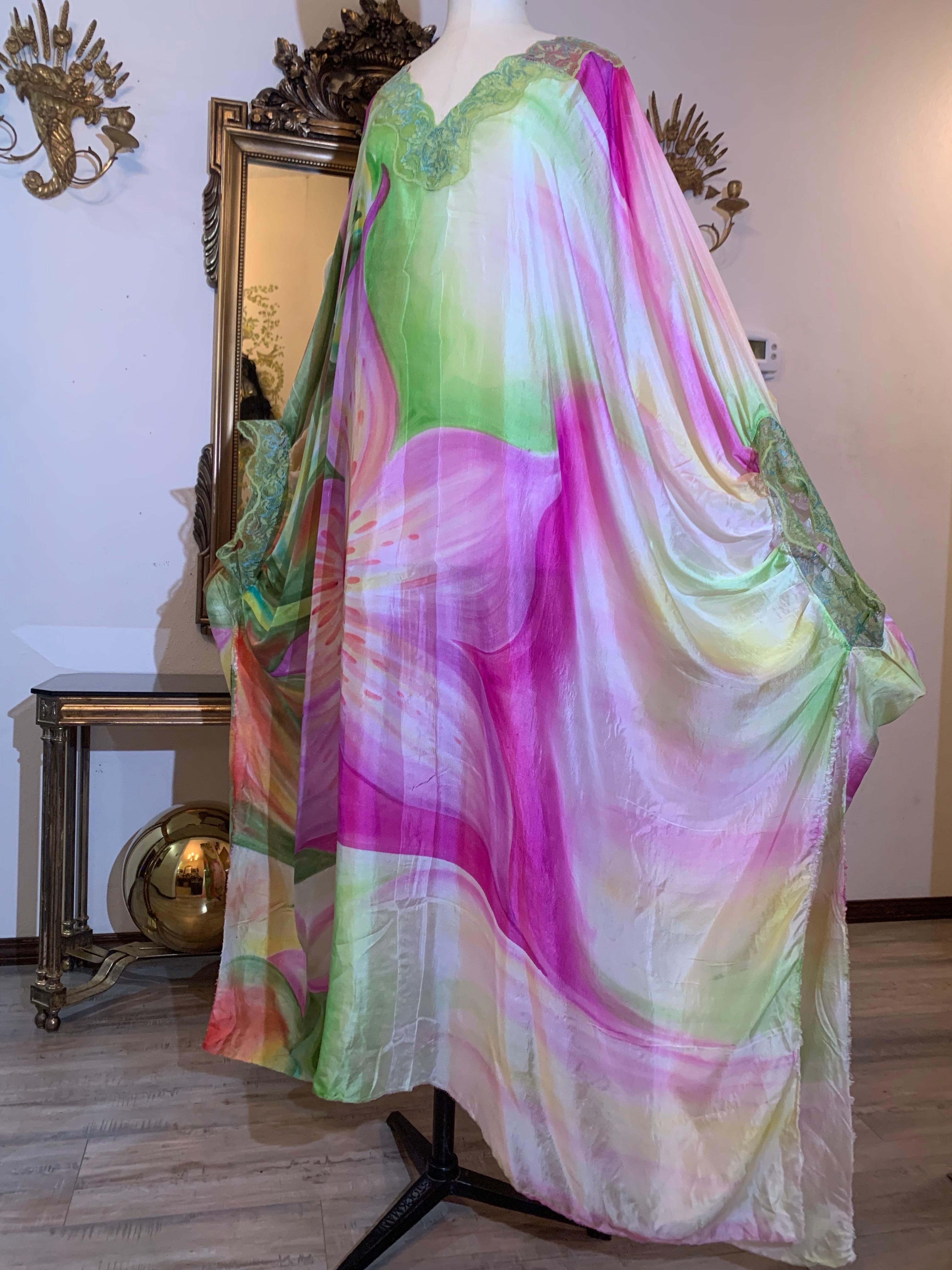 A fabulously sexy Torso Creations hand-painted imported parachute-weight silk lounging caftan with large-scale fuchsia lilies w green foliage!  Languid silk trimmed at collar and cuffs with wide lace. Generous and unstructured. One size fits all. 