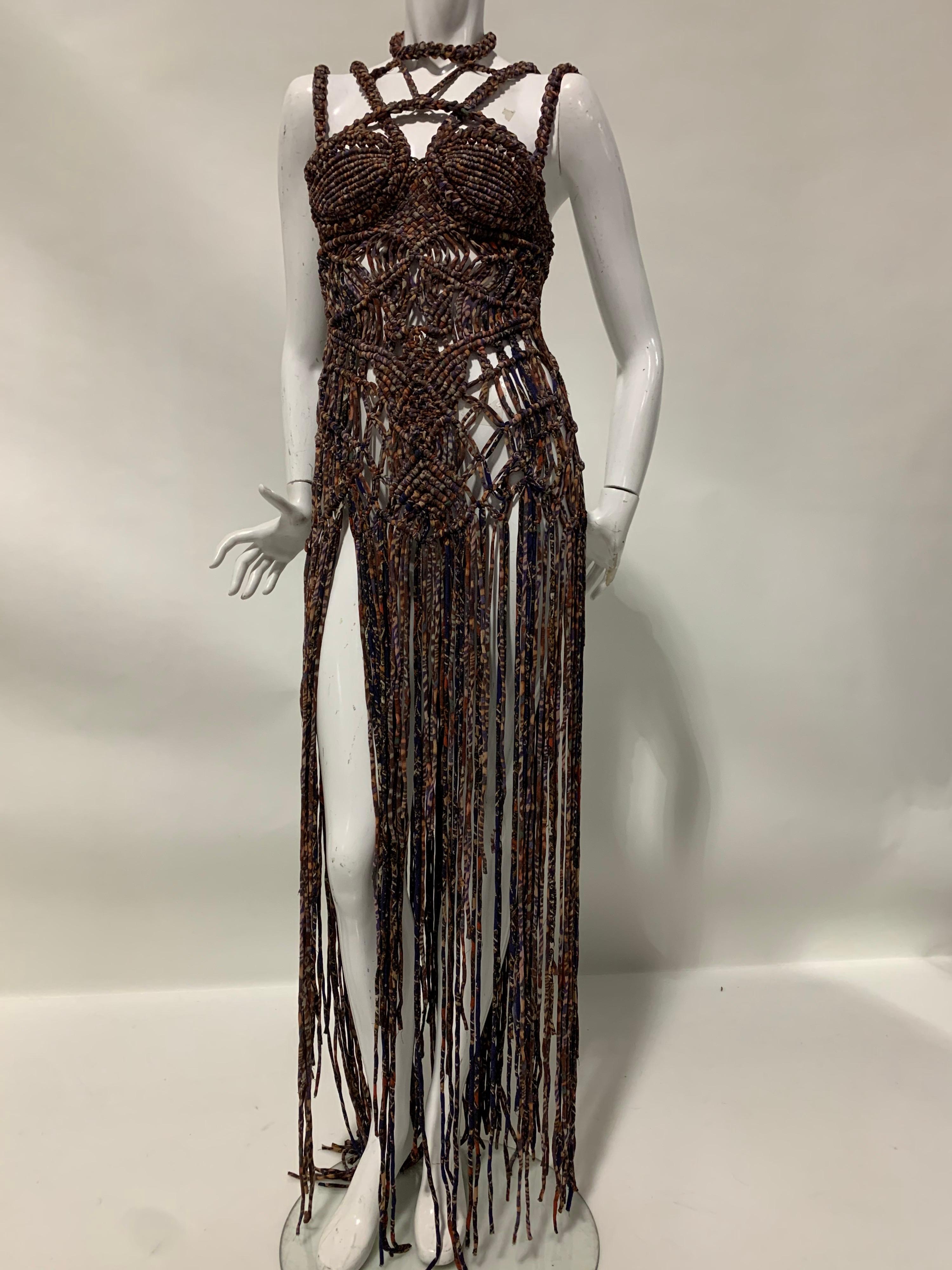 Torso Creations “Ibiza” Macrame Gown: Incredible hand-crafted macrame loungewear in sienna and indigo tones, constructed of microfiber stretch knitted piping, making it water friendly. Full length fringe adds drama to this one-of-a-kind piece.