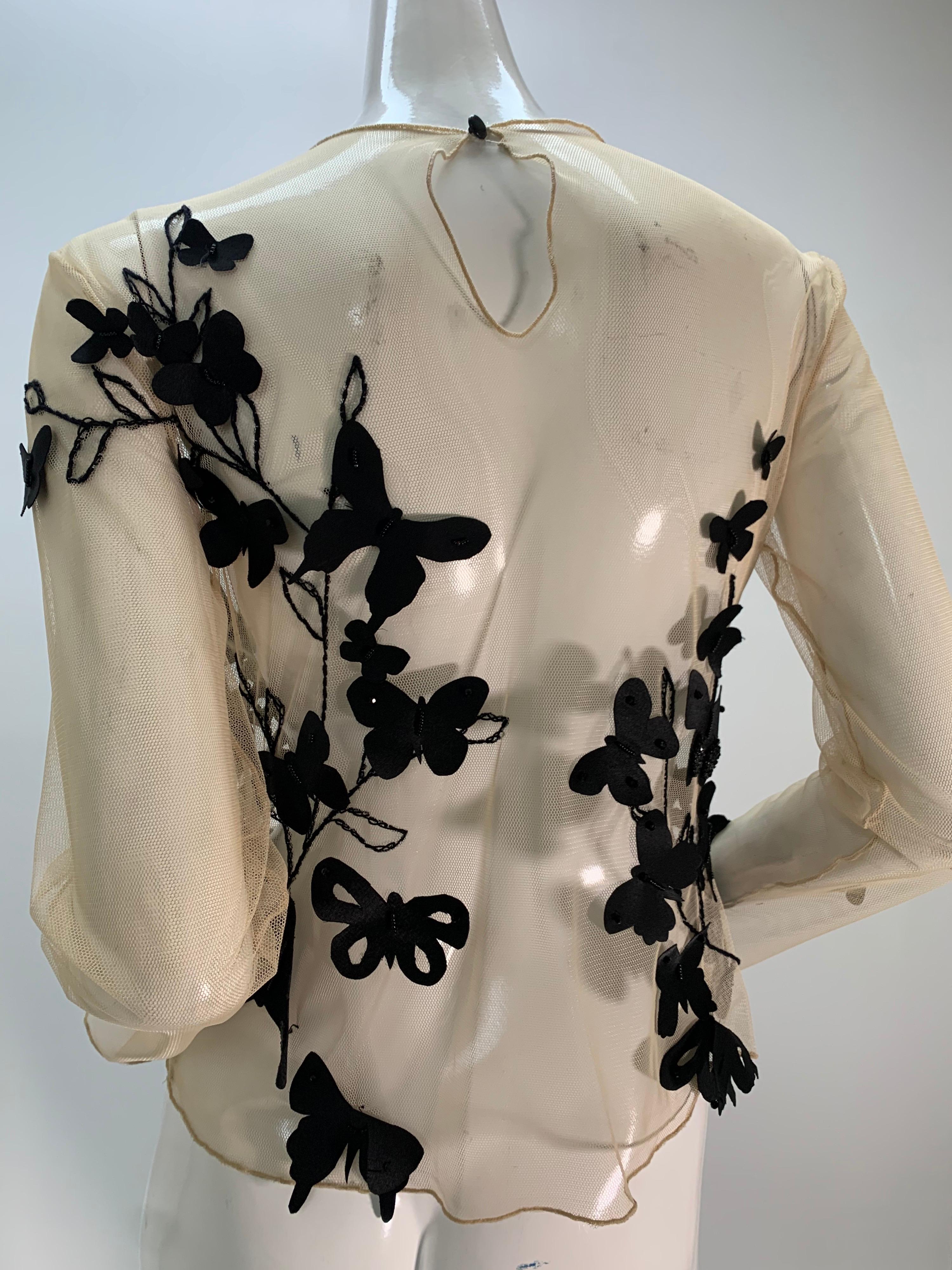 Torso Creations Hautfarbene & schwarze bestickte Bluse aus Tüll mit Schmetterlingsapplikationen in Schwarz  Damen im Angebot