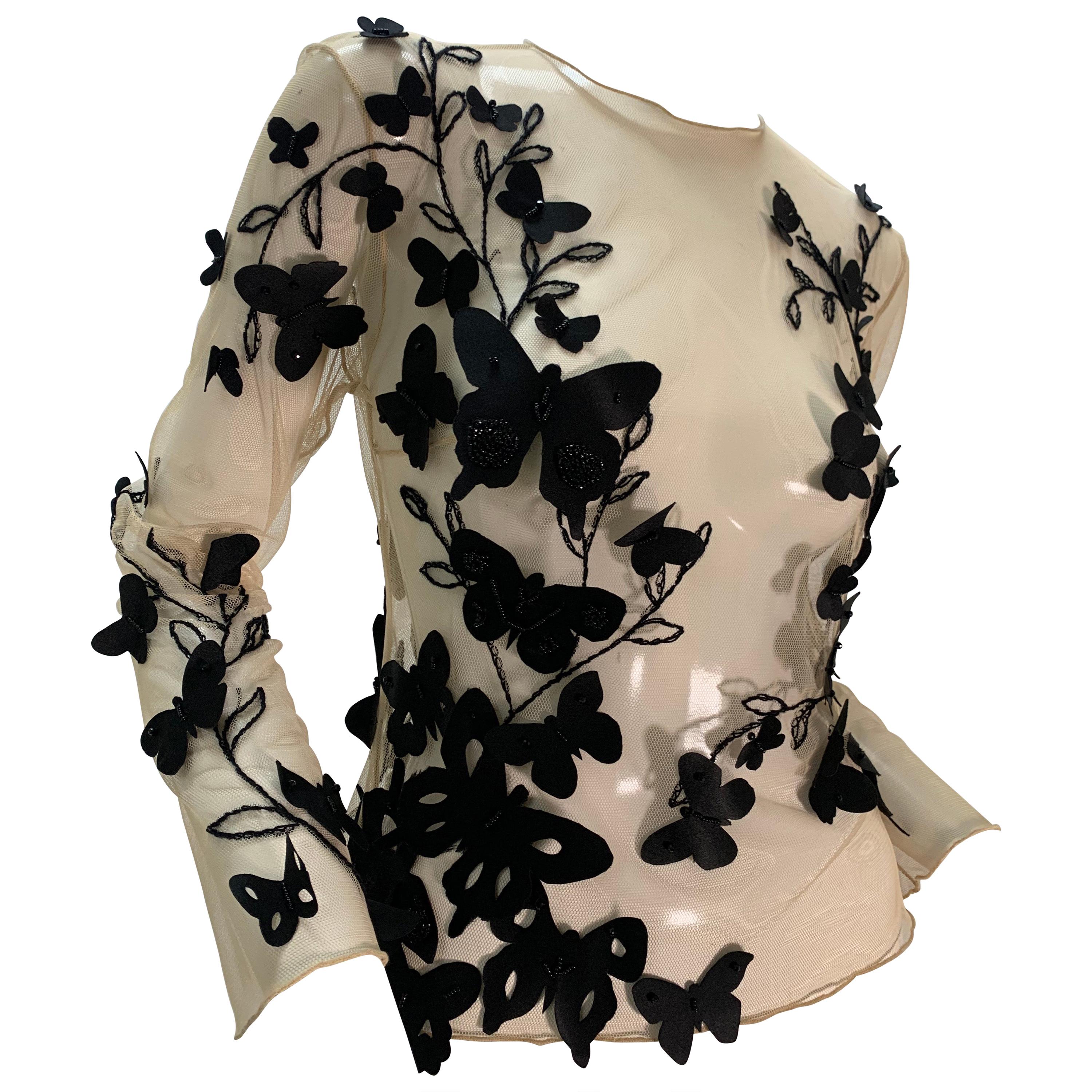 Torso Creations Hautfarbene & schwarze bestickte Bluse aus Tüll mit Schmetterlingsapplikationen in Schwarz  im Angebot