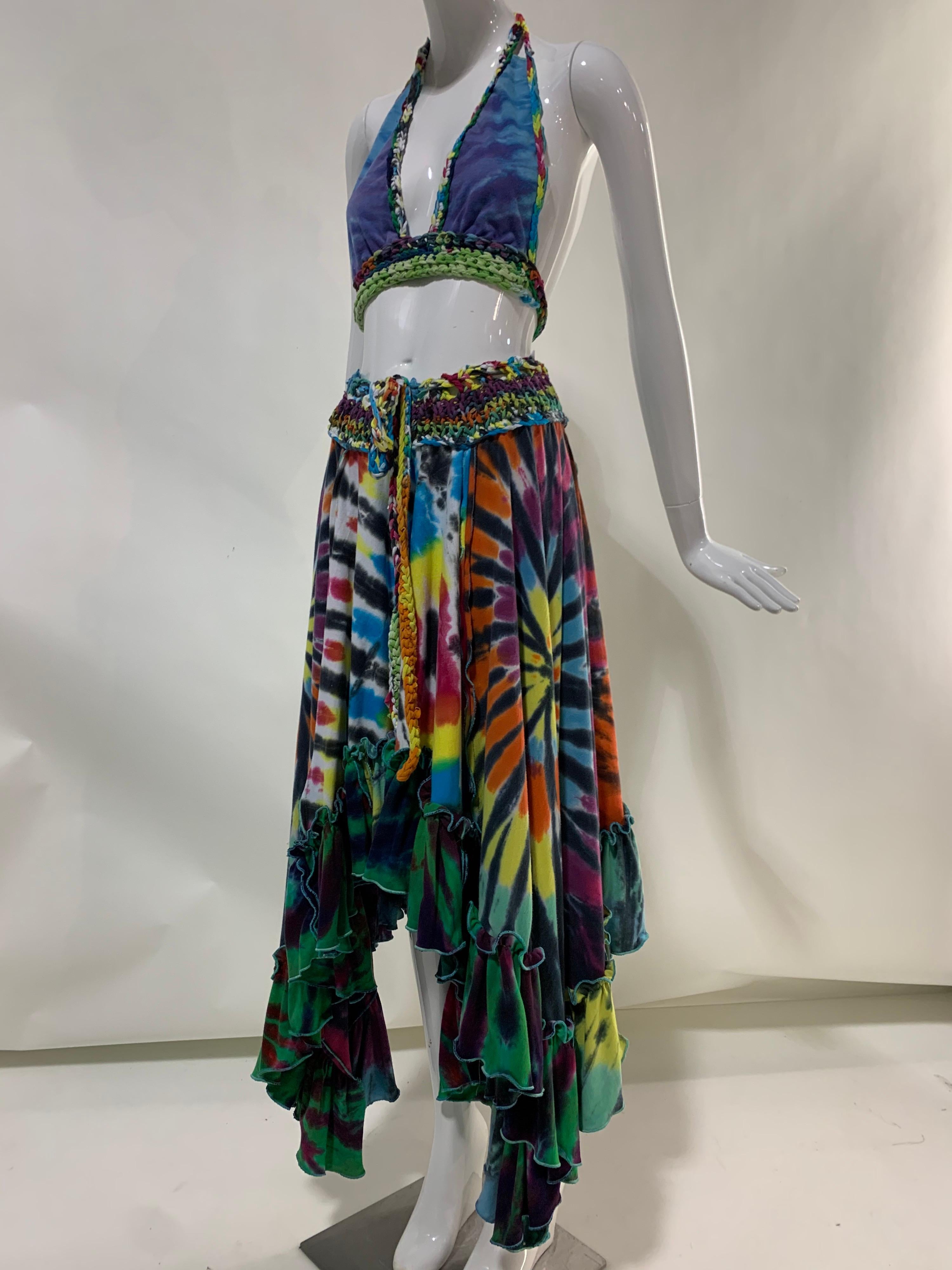 Torso Creations rainbow tie-dyed skirt and halter ensemble: Skirt has a hi-low hemline and ruffled tiers with a hand knit wide waistband and trim made from upcycled vintage t-shirts. Halter has matching fabric and knit details and ties at neck and