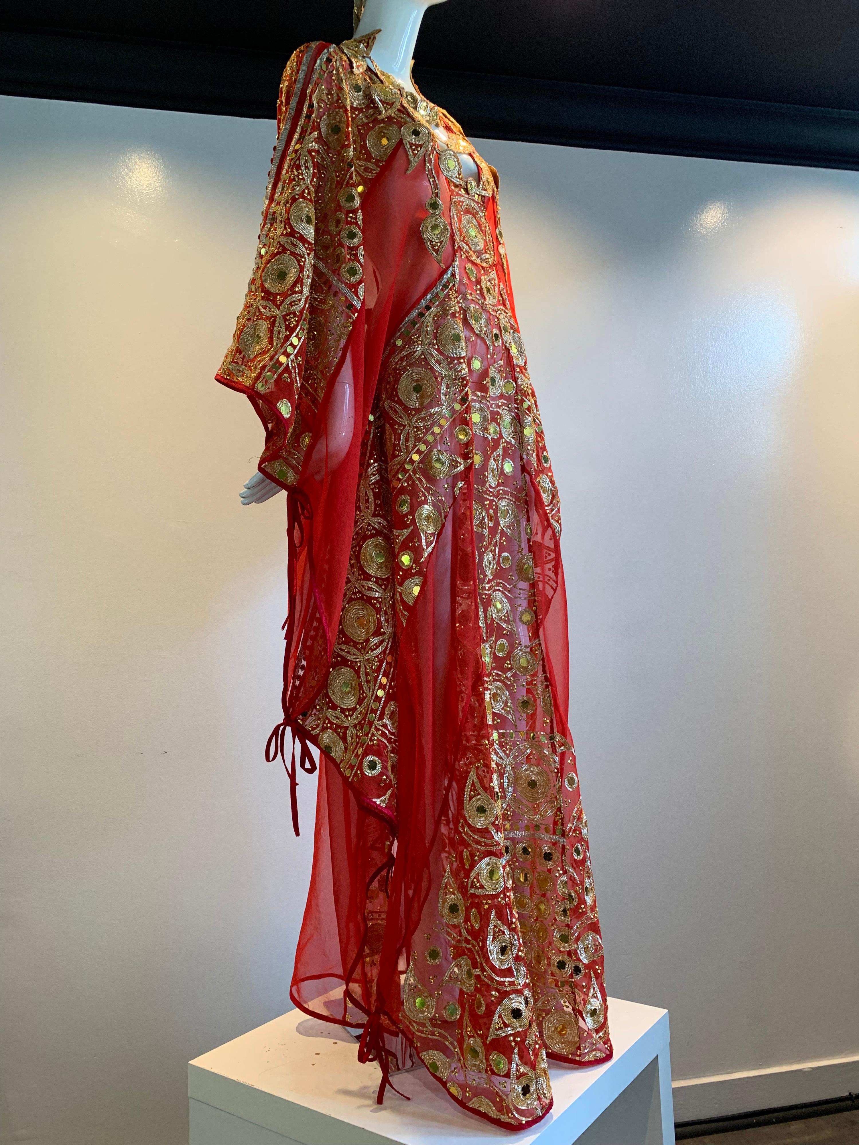 Torso Creations Red Silk Chiffon Caftan Heavily Embroidered W/ Gold & Sequins. One of a kind and uniquely fashioned from vintage red silk chiffon sari fabric in the style of Thea Porter. Fabric ties together at sides to give adjustibility in size