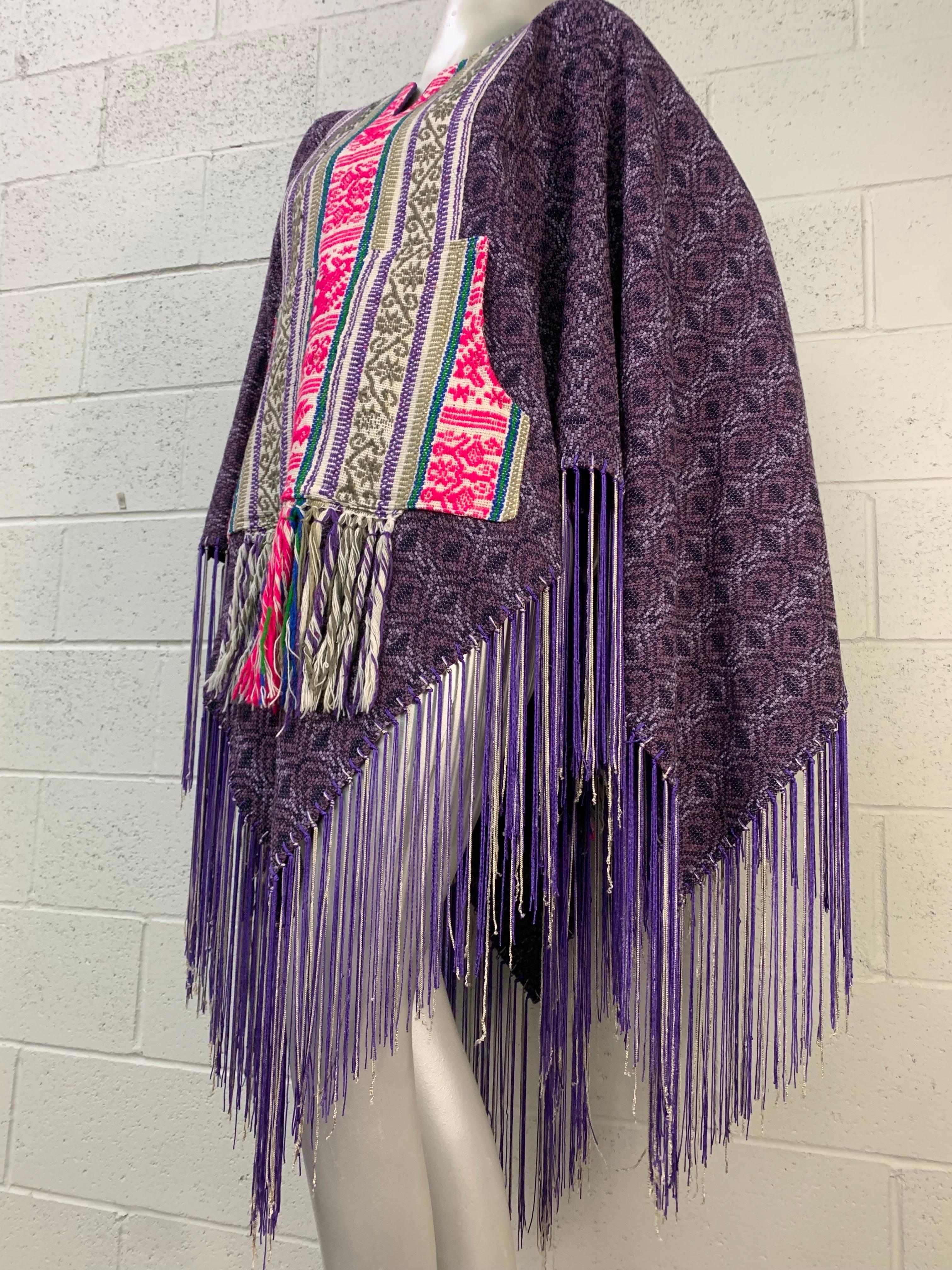 Torso Creations Wool & Silk Woven Poncho in Purple Pink & Gray w Fringed Hem:  The beauty of Central American-style woven patterns permiate this extravagant poncho. The added layer of contrasting vestment with center front pockets adds another handy