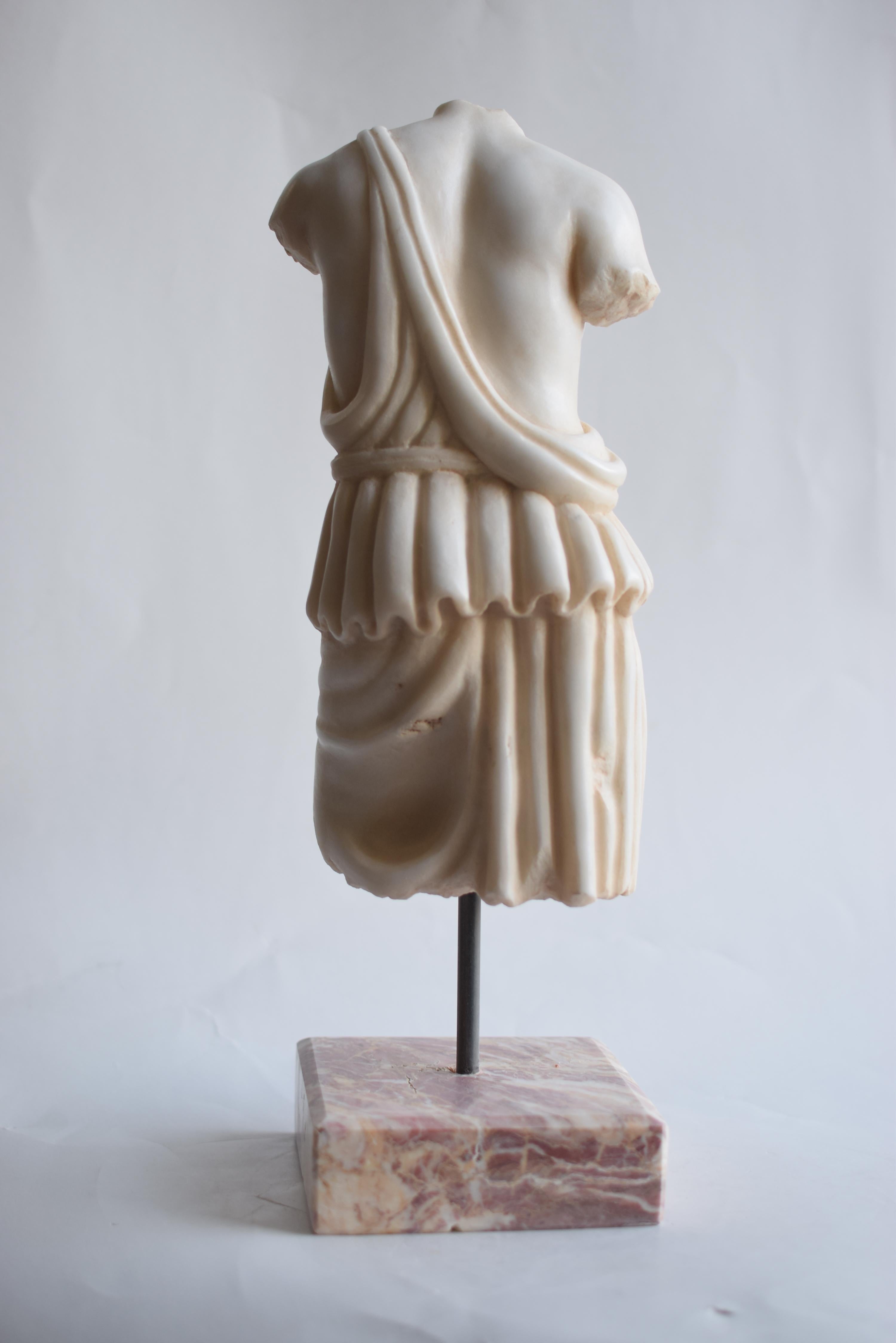Italian Female toga torso carved from white Carrara marble For Sale