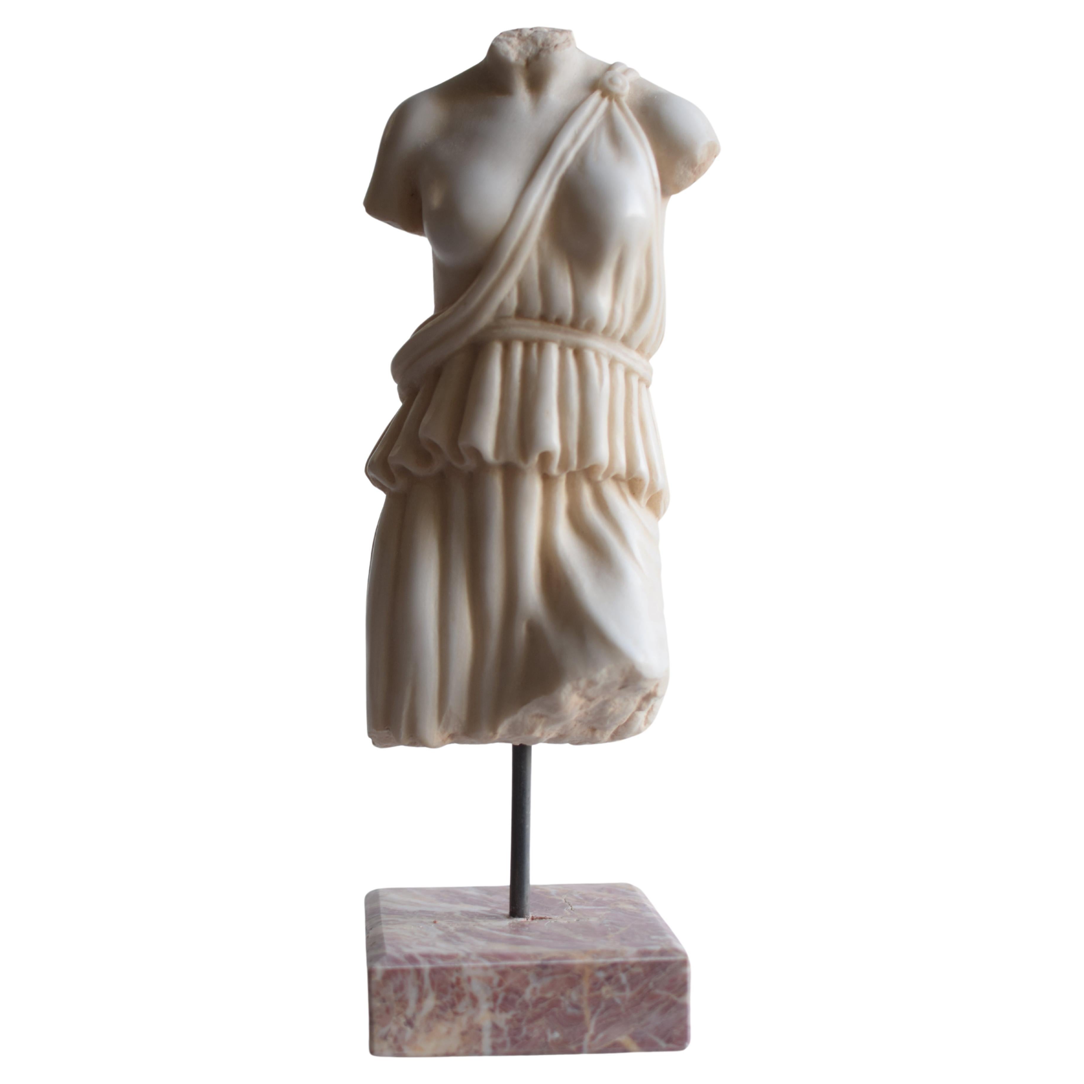 Female toga torso carved from white Carrara marble For Sale