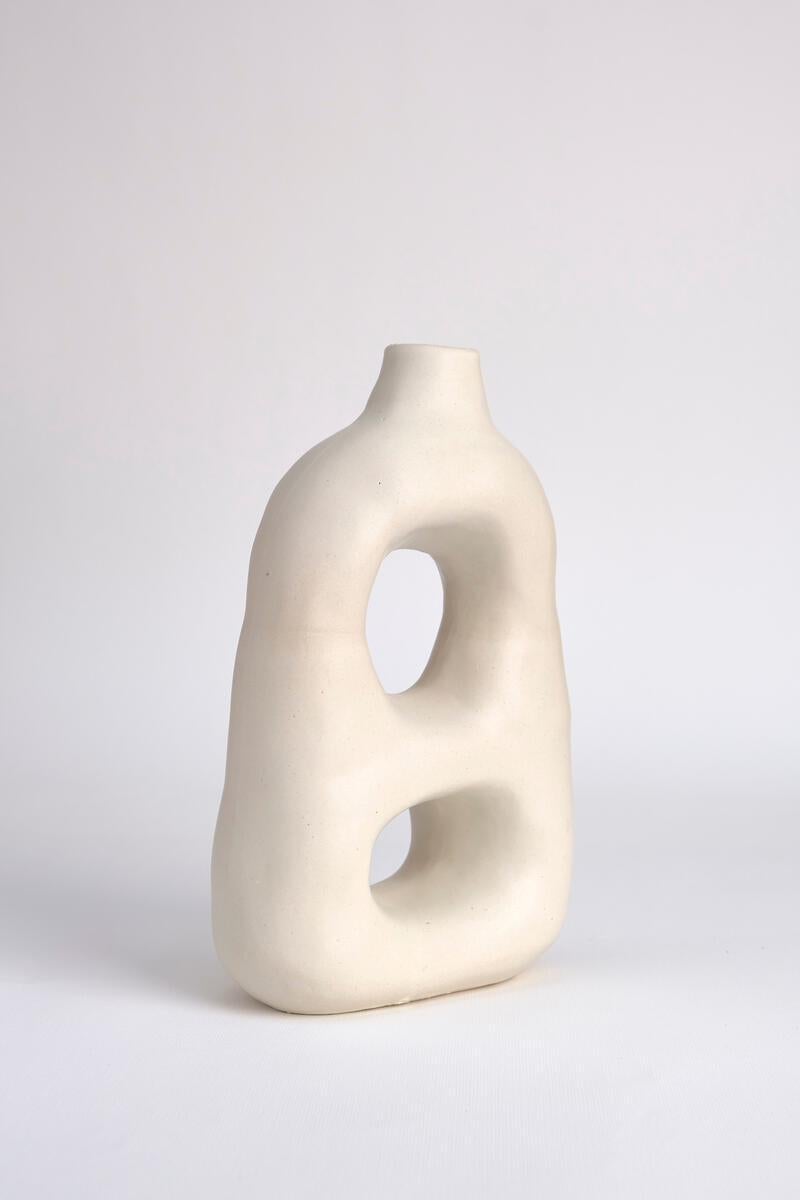 Ceramic sculptural vase from the permanent collection.

Dimensions; 17 x 8 x25.
