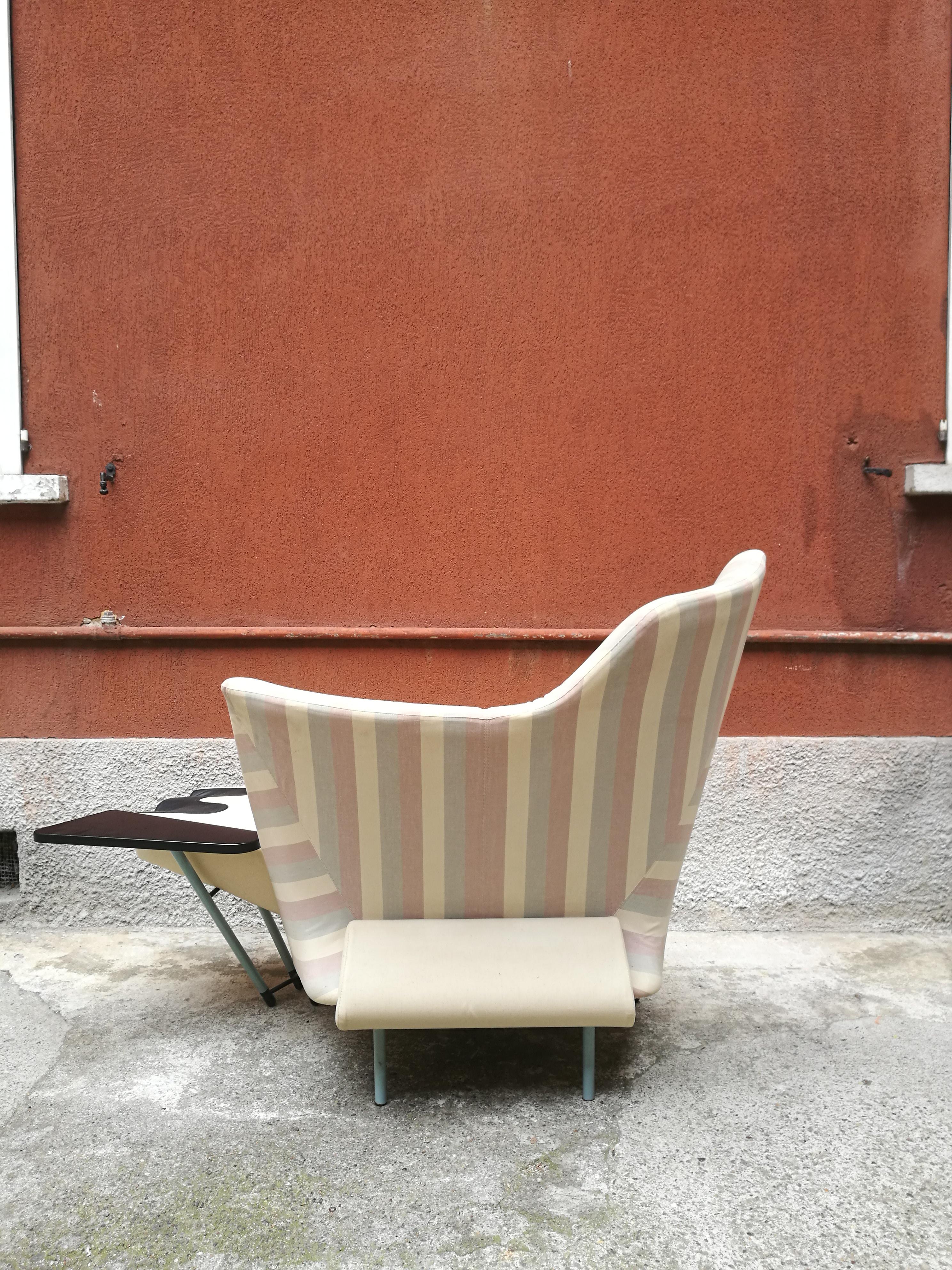 Torso lounge chair by Paolo Deganello for Cassina, from 1960s.
Torso lounge chair by Paolo Deganello, amazing piece from 1960s covered in striped fabric, in white cream, pink and light blue. The base is grey painted, with an unusual slanting leg. In