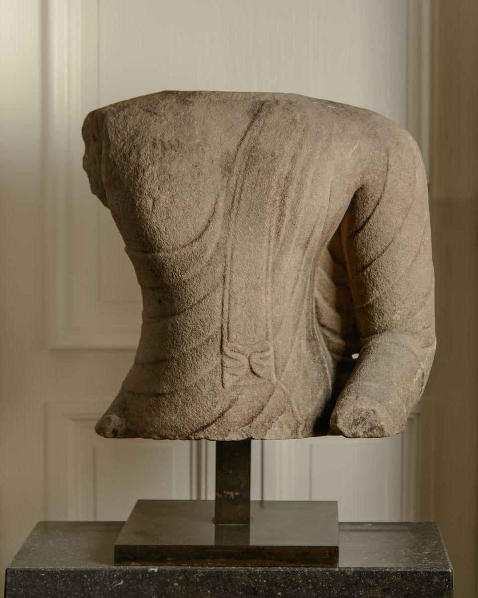 Torso of Buddha

Kingdom of Ayutthaya (1350-1767), 17th century.

Carved sandstone, height (including base) 64 cm.


Provenance: 

The Sassoon Family Collection, Lausanne, Switzerland;
where acquired by the present owner.

The