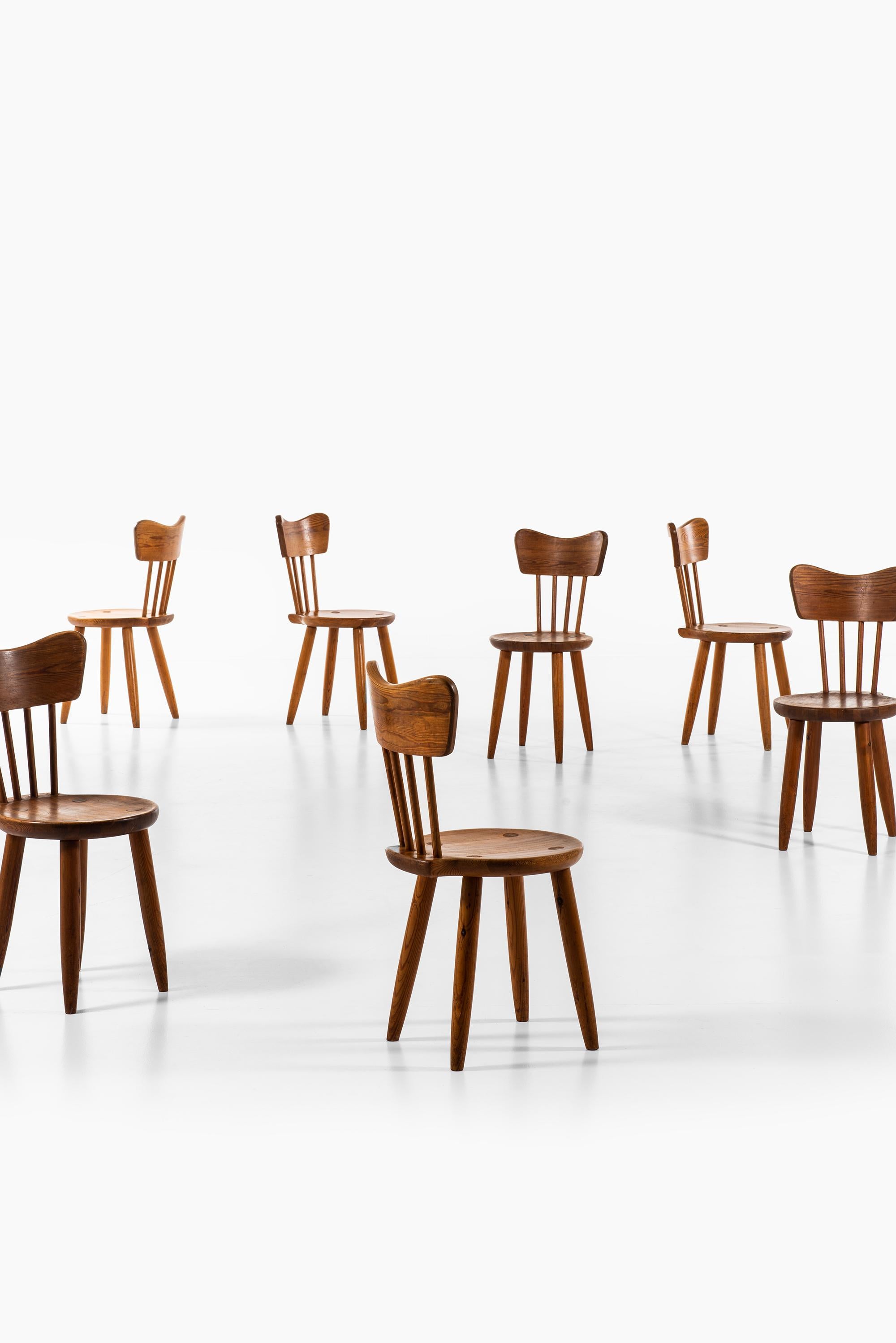 Rare set of 10 dining chairs designed by Torsten Claeson. Produced by Steneby Hemslöjd in Sweden. Retailed at Meeths in Gothenburg, Sweden.