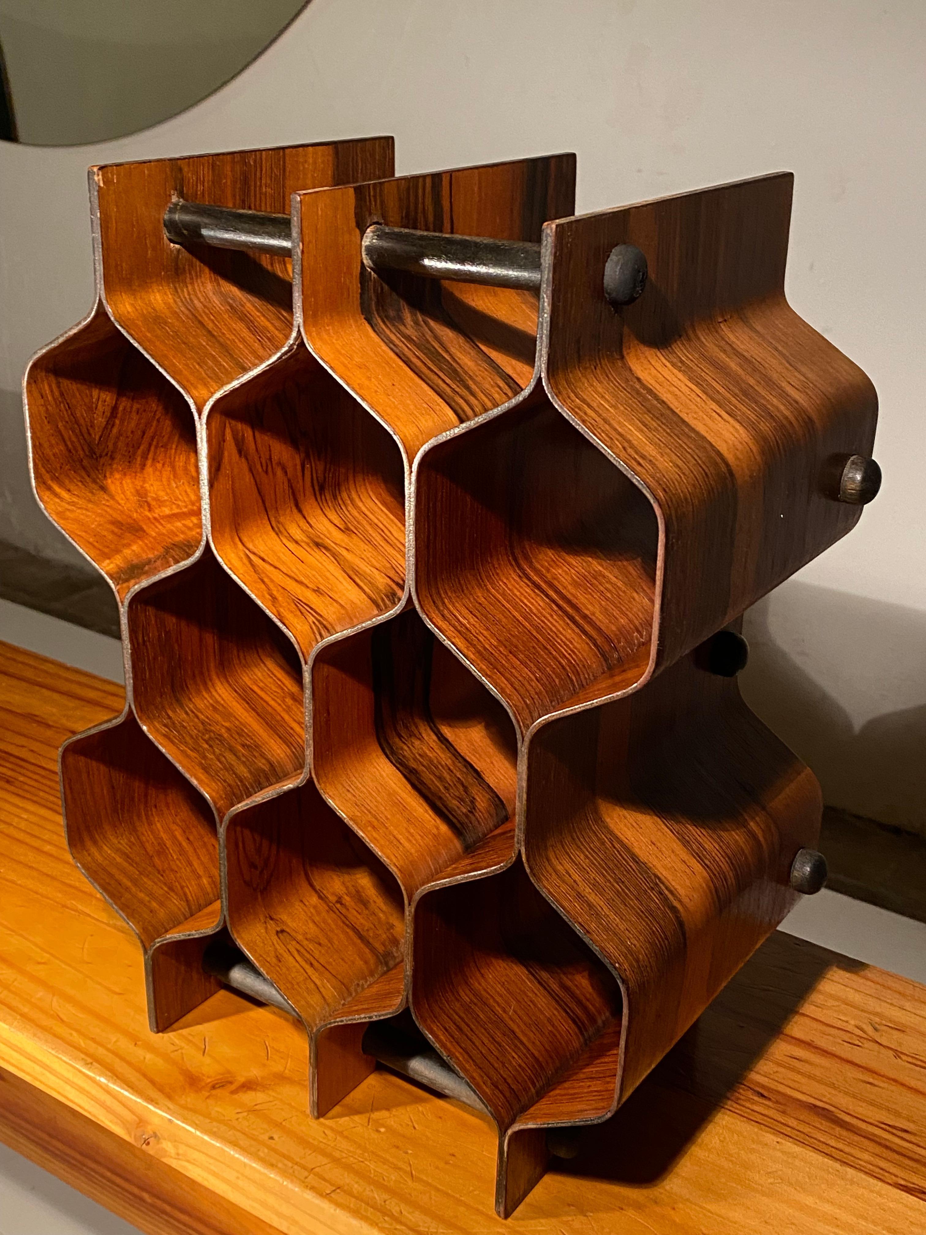Honest original vintage example of a plywood Honey Comb wine rack by Scandinavian designer Torsten Johansson for AB Former Sweden made in the early 1960's

This wine rack is a multifunctional design classic as its perfect for not only storing but