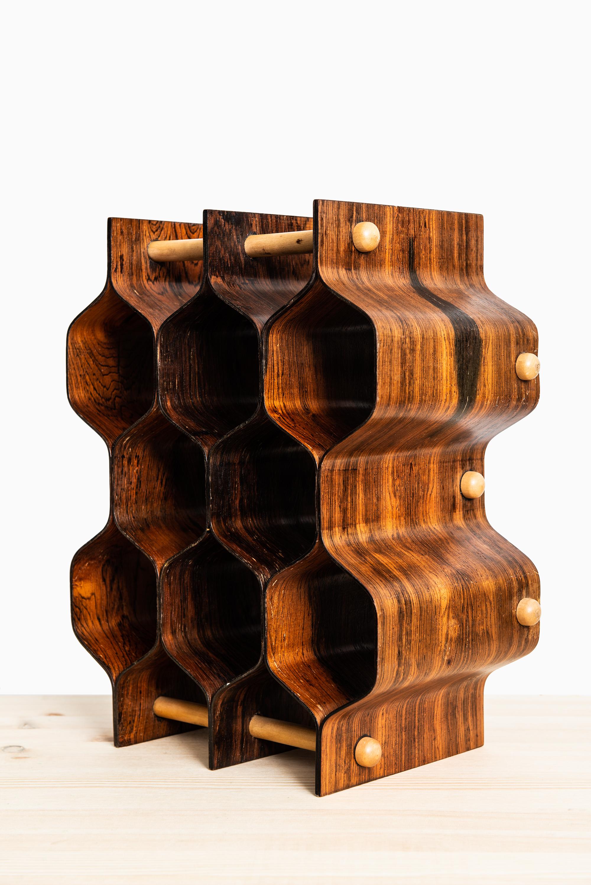 Wine rack / bottle stand designed by Torsten Johansson. Produced by AB Formträ in Sweden.